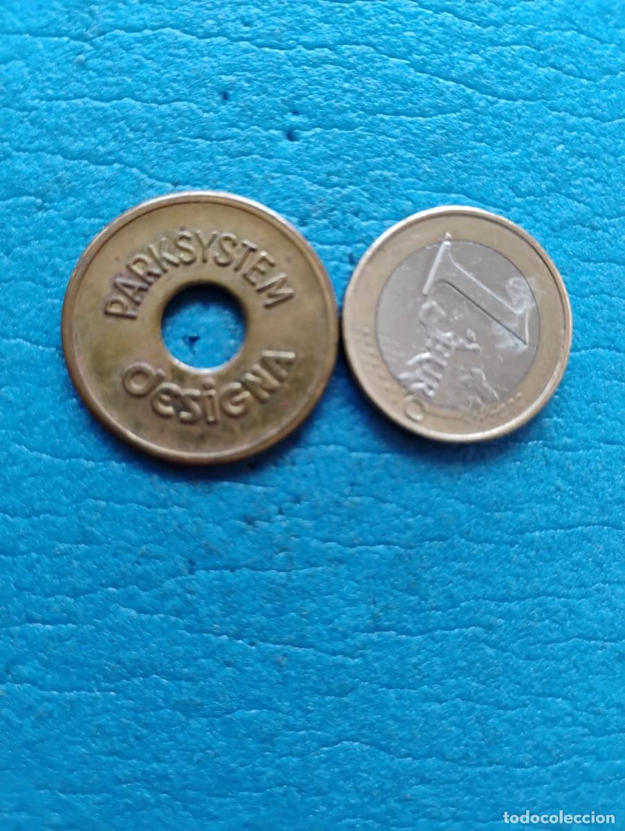 Monedas locales: 1 FICHA PARKSYSTEM DESIGNA - 25 mm. DE DIAMETRO