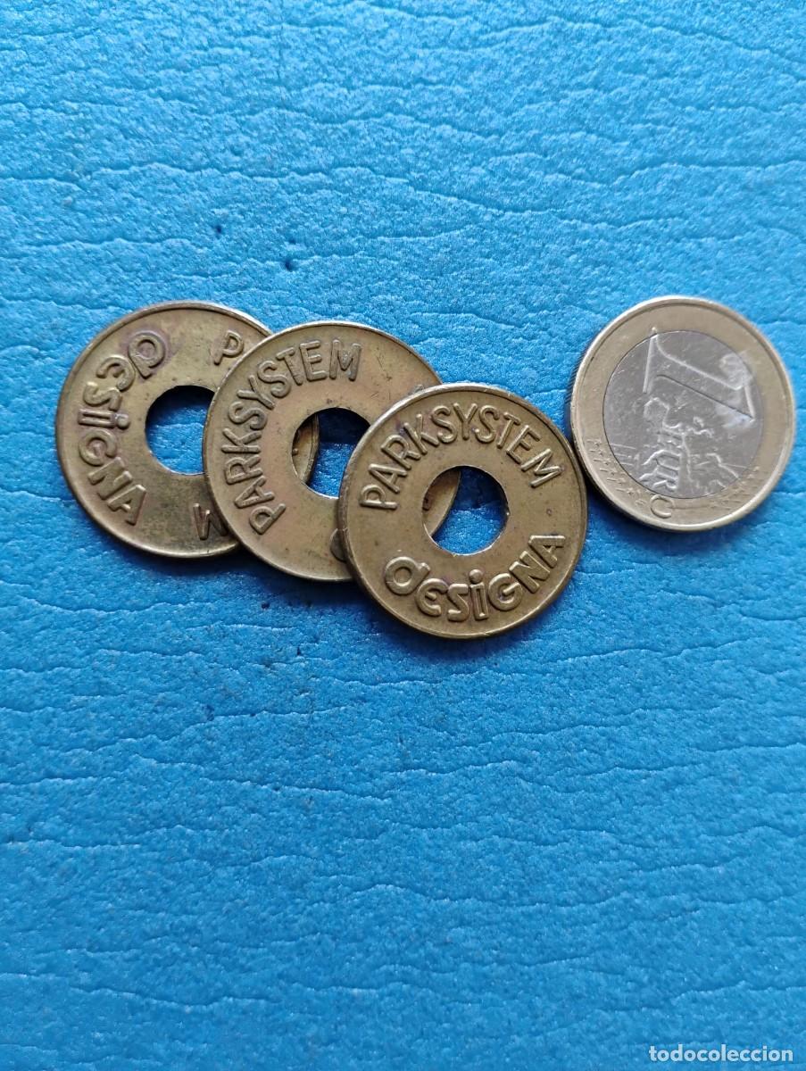Monedas locales: 3 FICHAS PARKSYSTEM DESIGNA - 23 mm. DE DIAMETRO