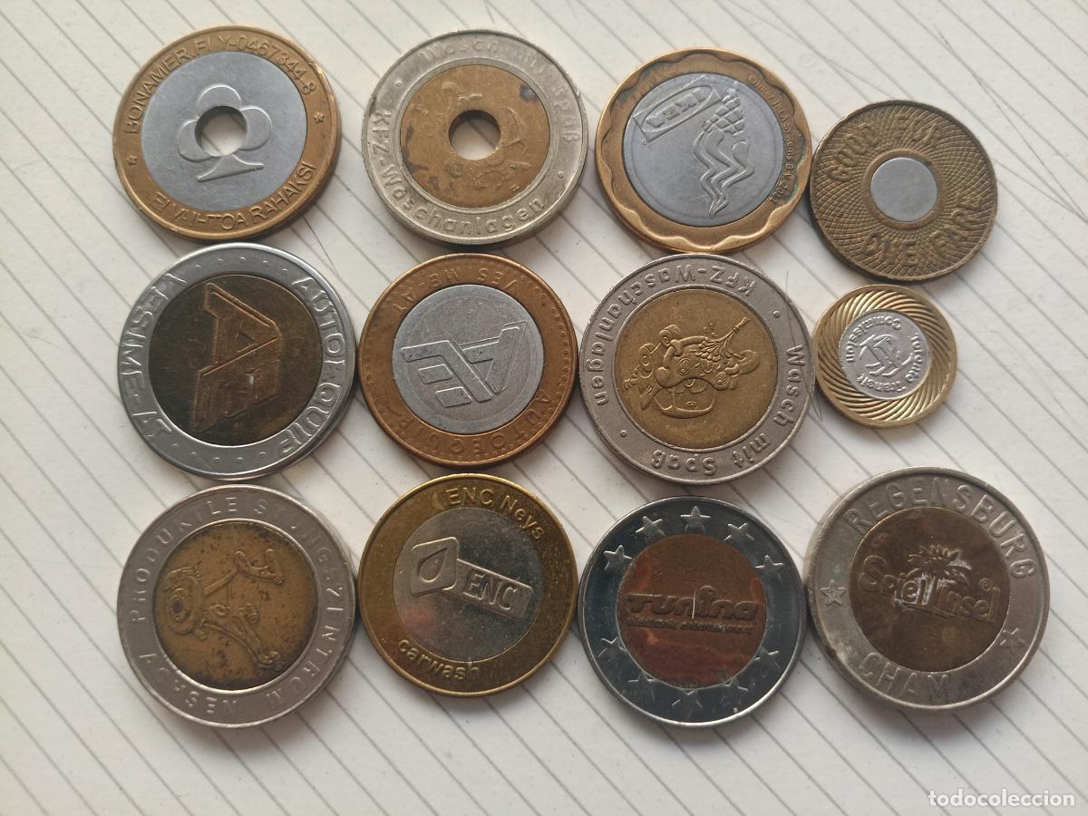 Monedas locales: 12 fichas bimet&aacute;licas