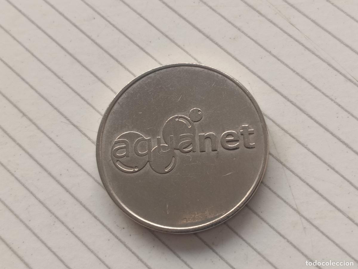 Monedas locales: Aquanet. Ficha met&aacute;lica
