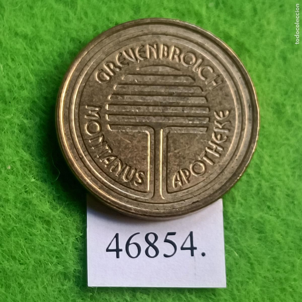 Monedas locales: ficha, Alemania, Grevenbroich, apotheke Monti, farmacia Montanus, token, jet&oacute;n.