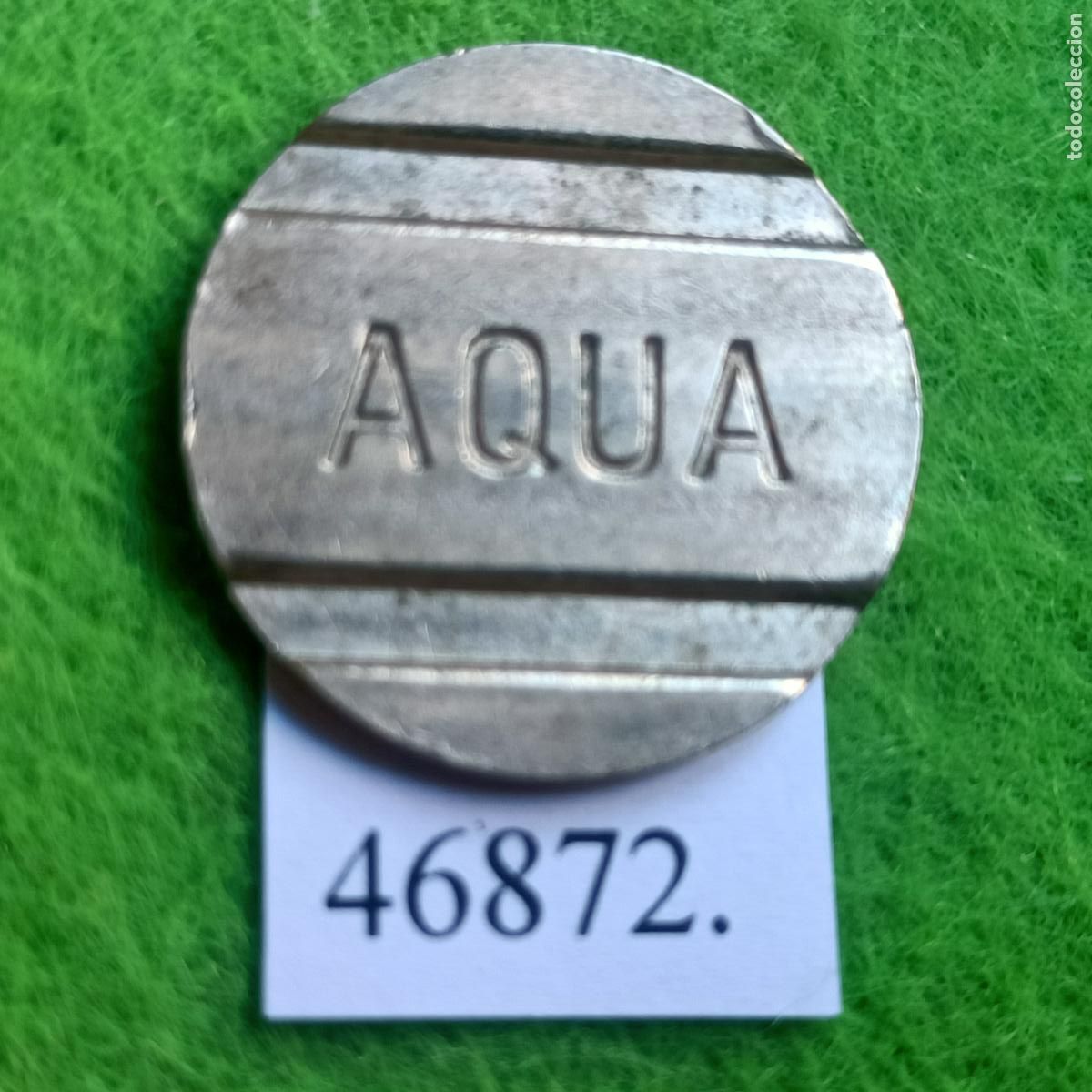 Monedas locales: Ficha ranurada, AQUA, autoservicio, vending, token, jeton