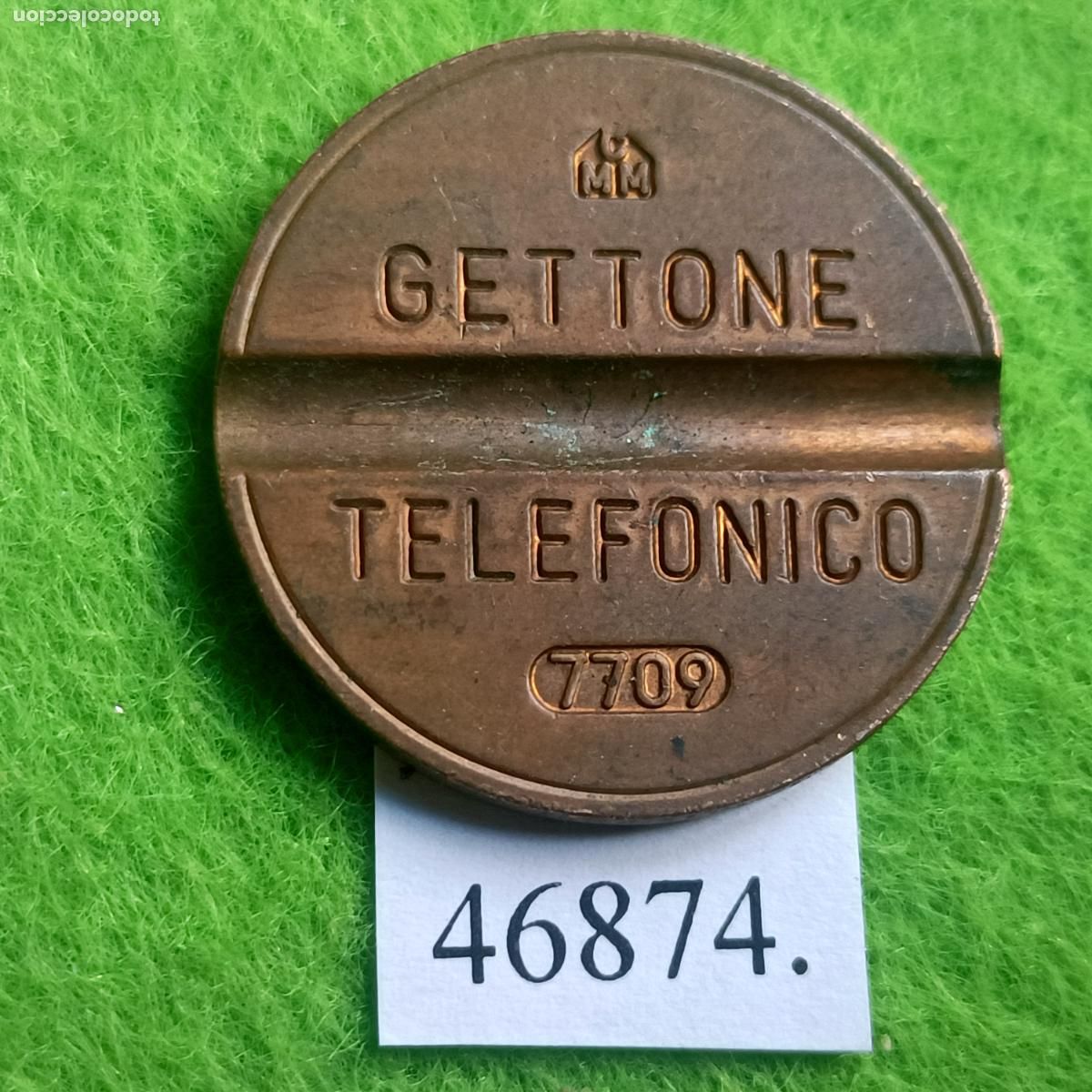 Monedas locales: ficha tel&eacute;fono Italia, 7709 CMM, token, jet&oacute;n