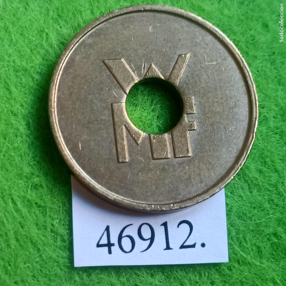 Monedas locales: Ficha, Alemania, autolavado, carwash, WMF jet&oacute;n