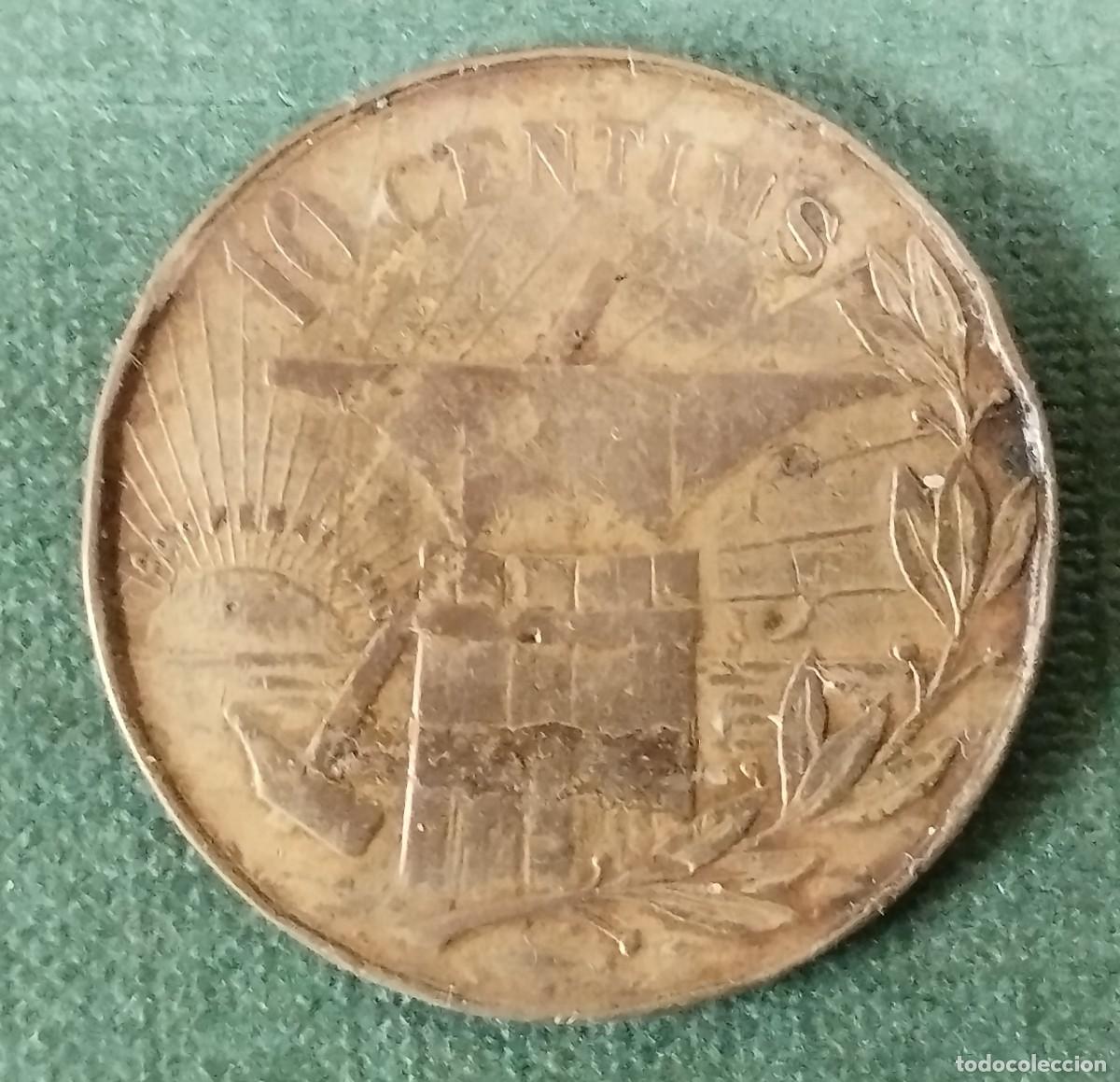 Monedas locales: FICHA DE 10 C&Eacute;NTIMOS DE LA COOPERATIVA LA FLOR DE MAIG - FUNDADA 1890 BARCELONA