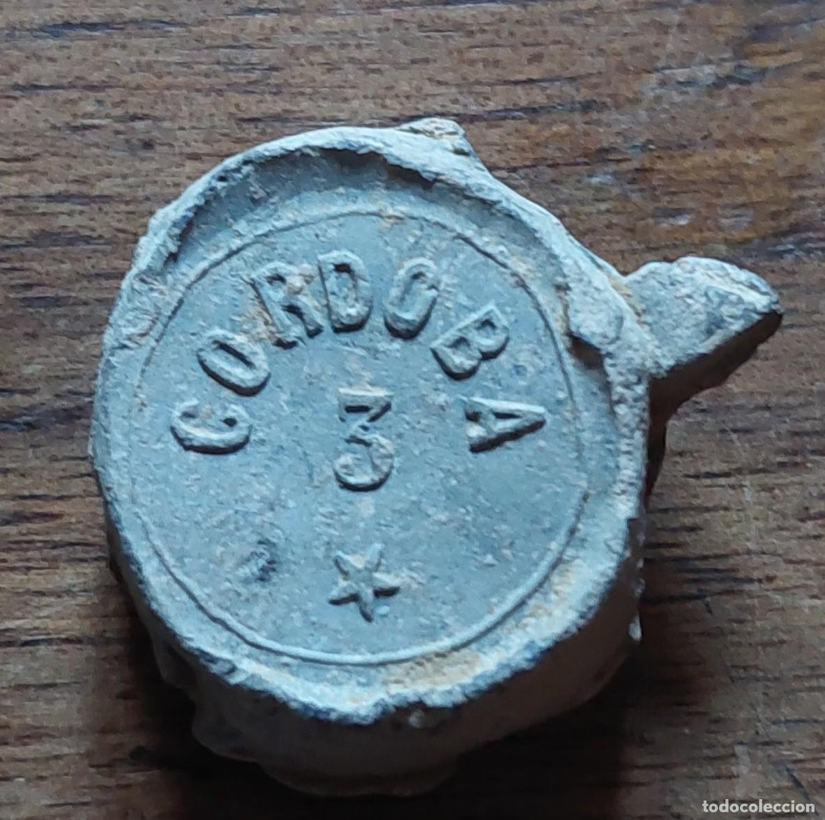 Monedas locales: Plomo marchamo correos C&oacute;rdoba 3