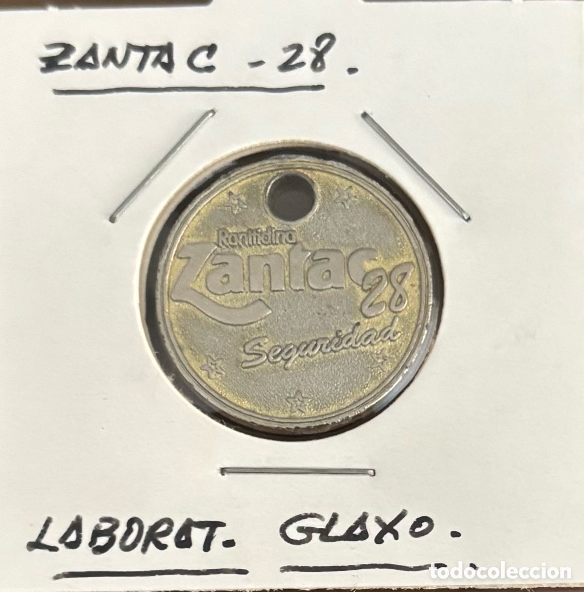 Monedas locales: Zantac. Publicidad medicamento