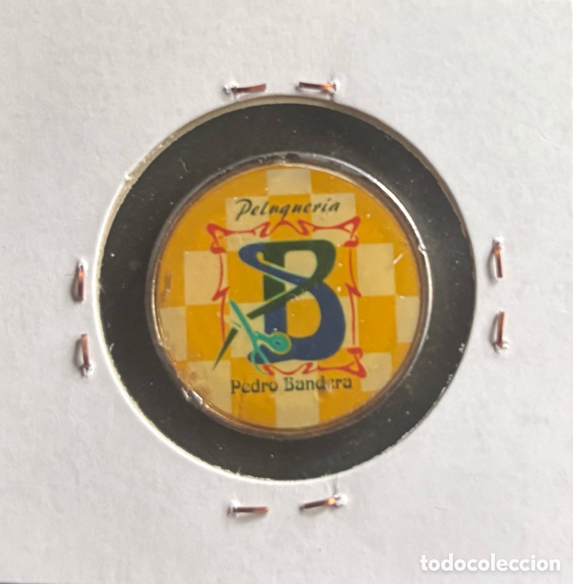 Monedas locales: Pedro Bandera Peluquer&iacute;a M&aacute;laga