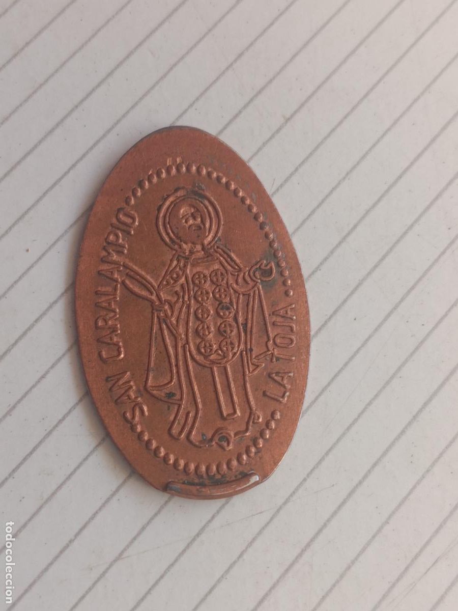 Monedas locales: San Caralampio, La Toja, ficha enlongada