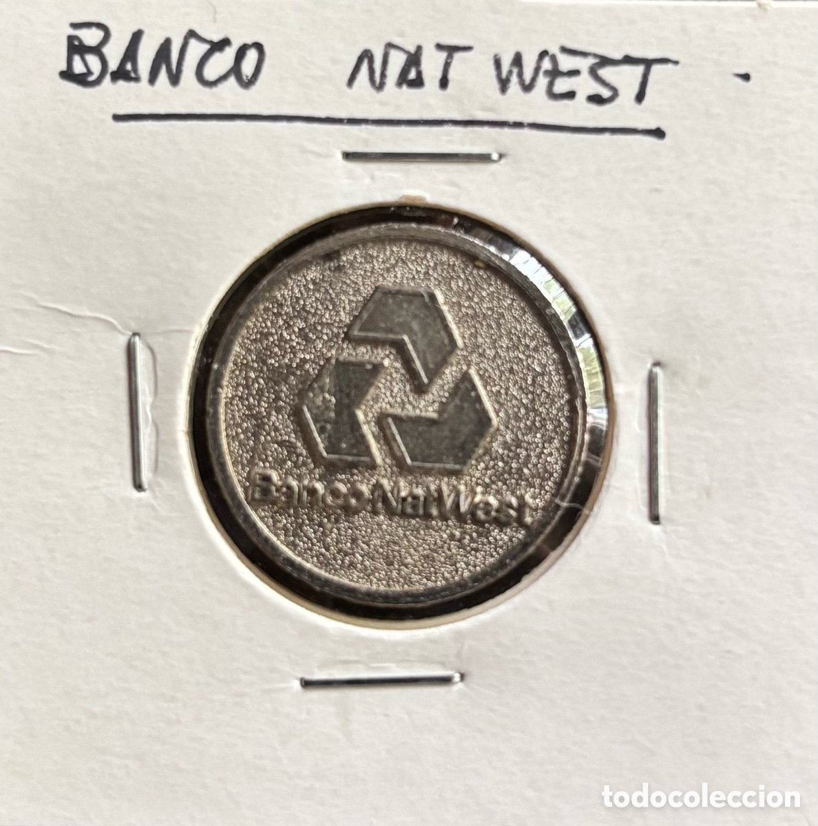 Monedas locales: Ficha publicidad. Banco Nat West