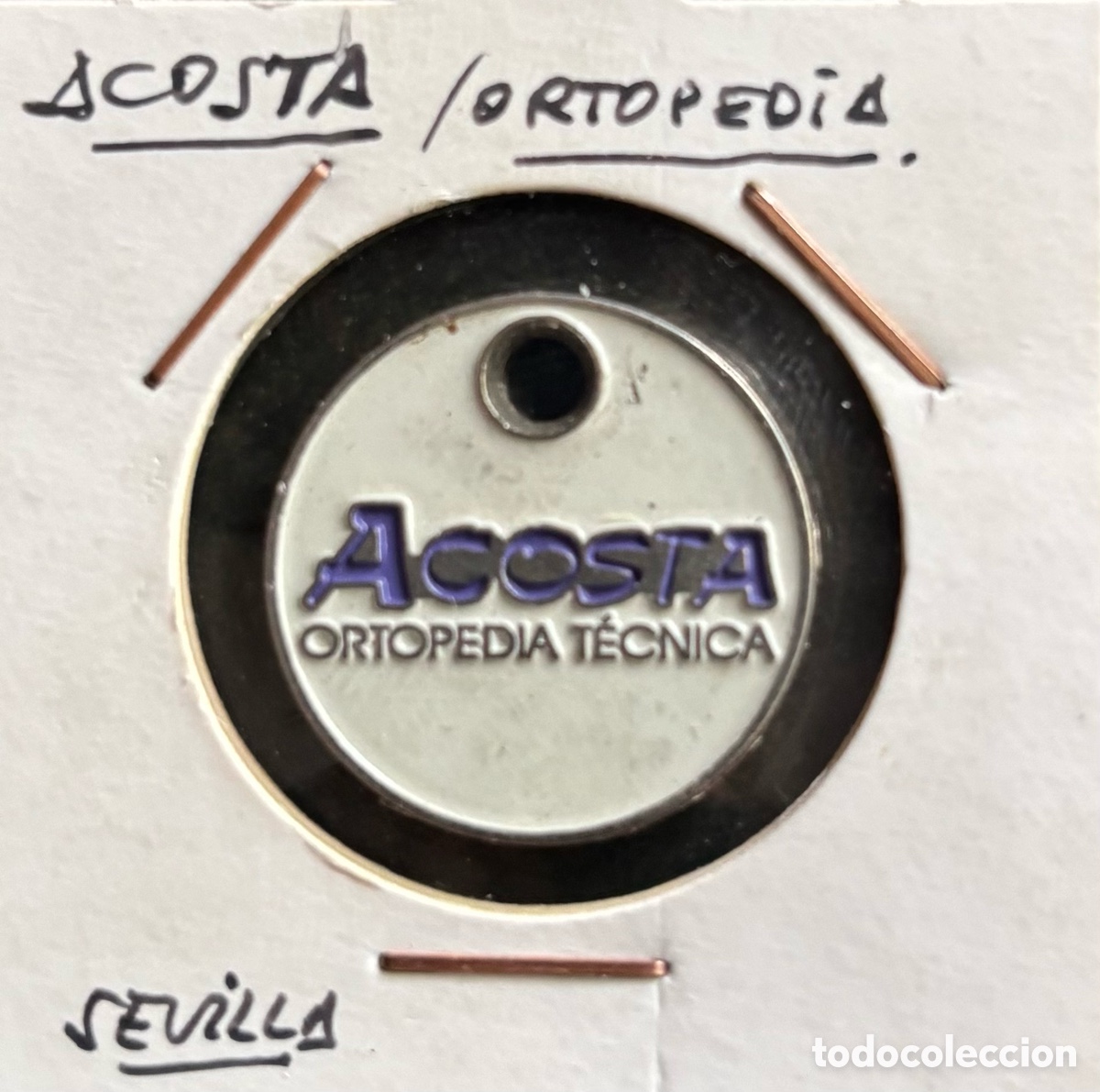 Monedas locales: Ficha publicidad. Acosta ortopedia. Sevilla