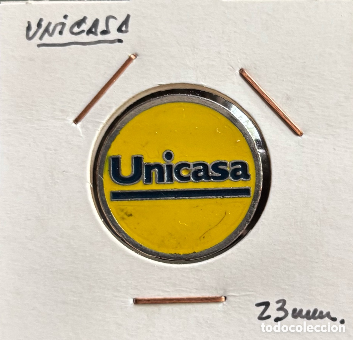 Monedas locales: Ficha publicidad. Unicasa