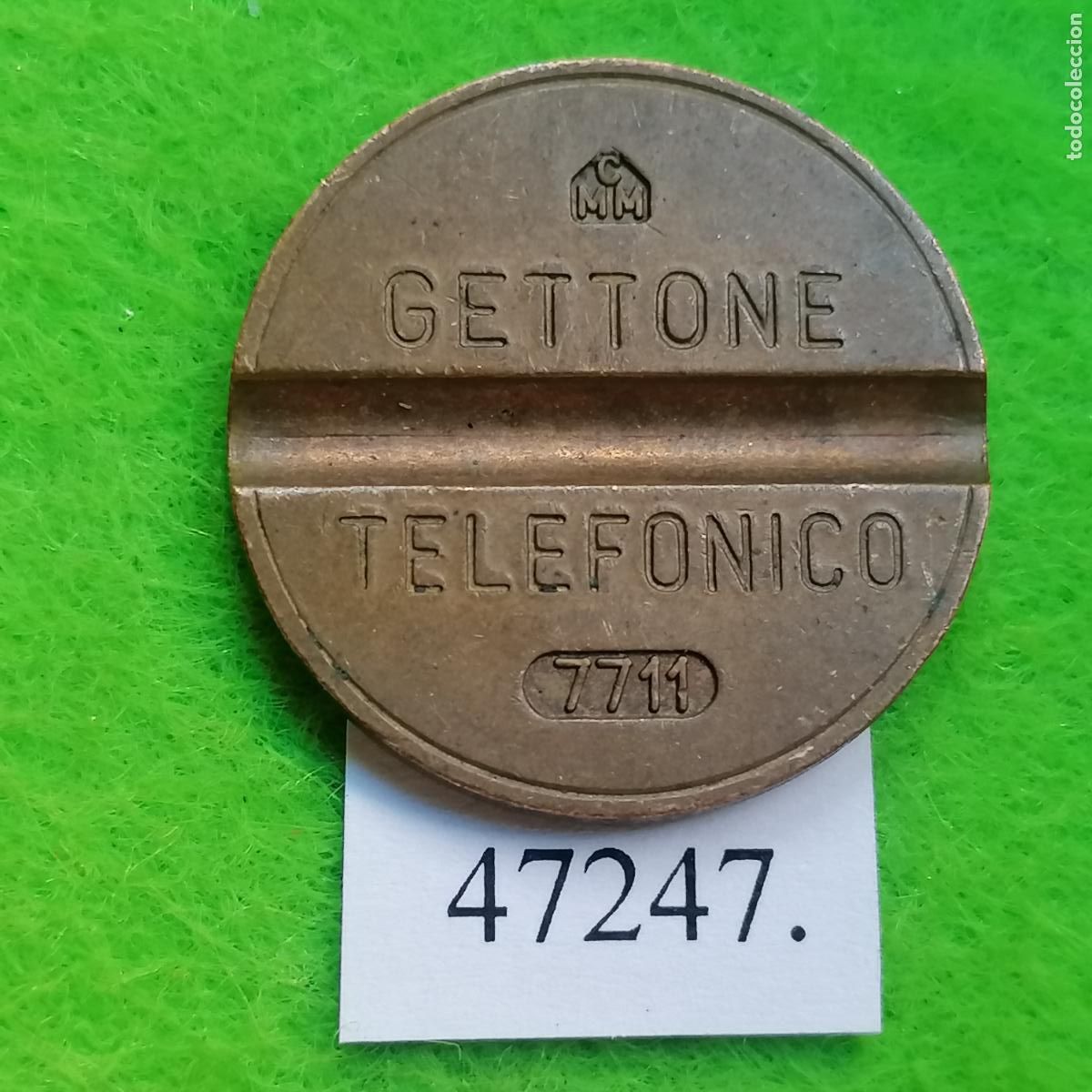 Monedas locales: ficha telef&oacute;no Italia , 7711 C.M.M., token, jet&oacute;n