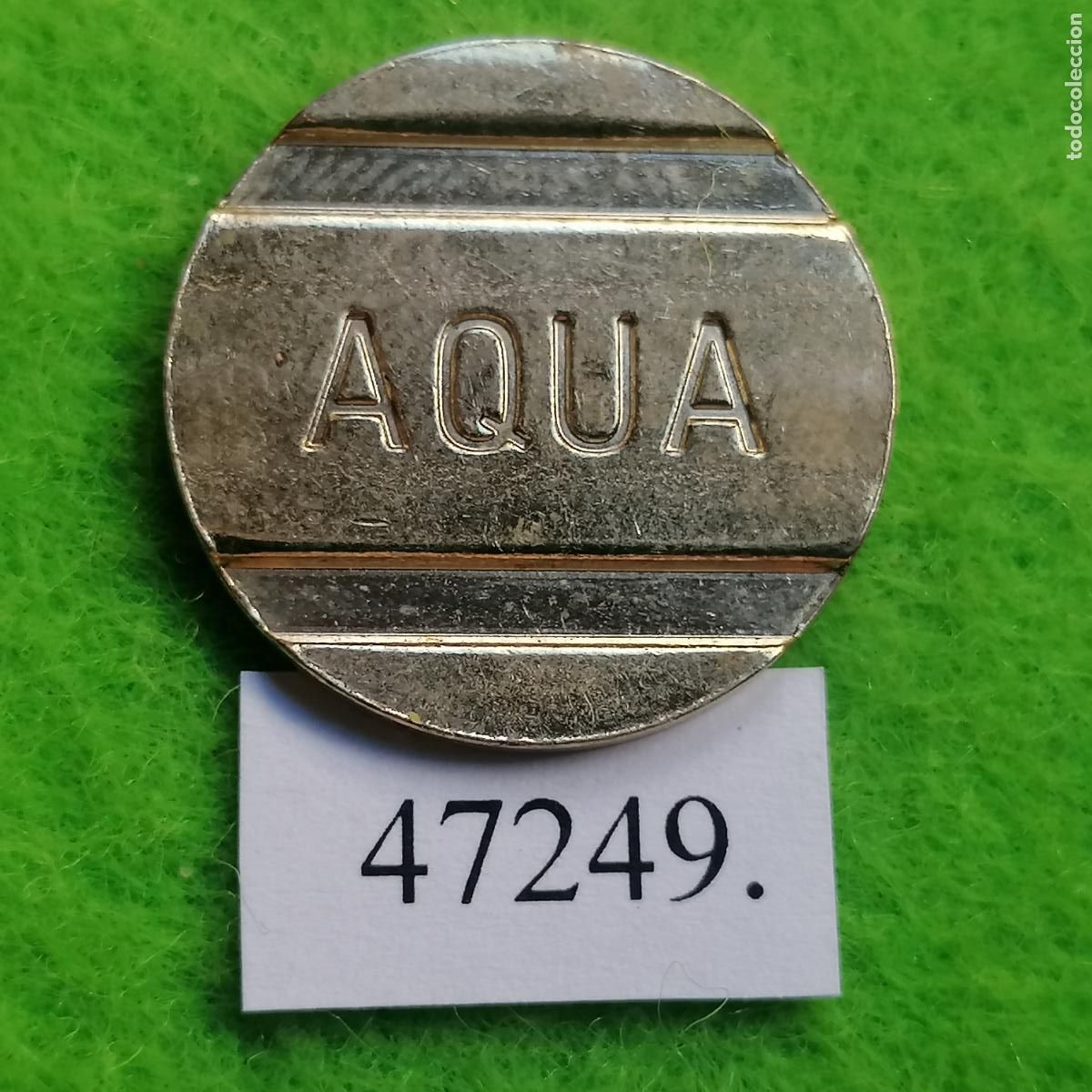Monedas locales: ficha ranurada, AQUA, color blanco, token, jet&oacute;n
