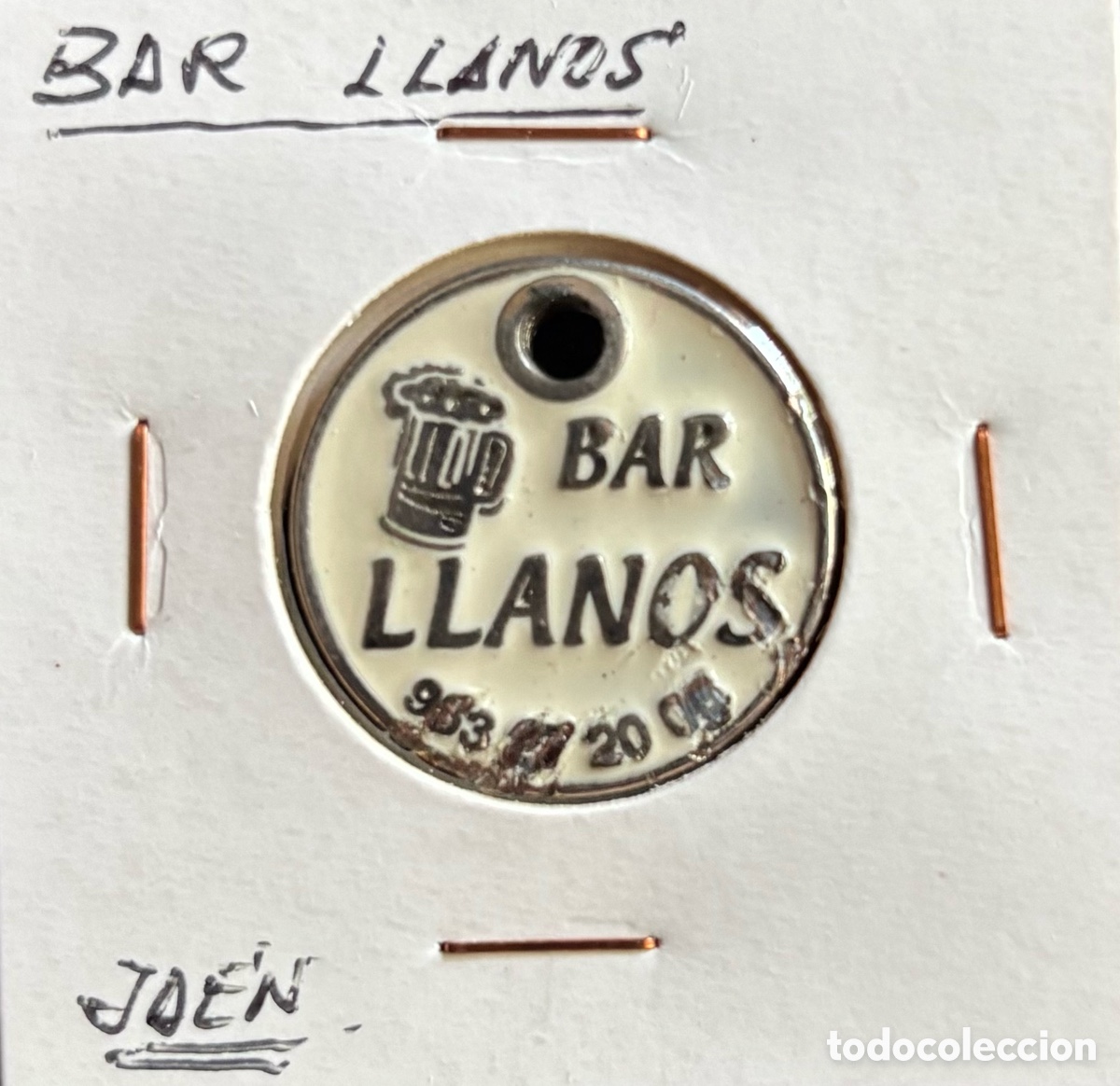 Monedas locales: Ficha publicidad. Bar Llanos. Ja&eacute;n