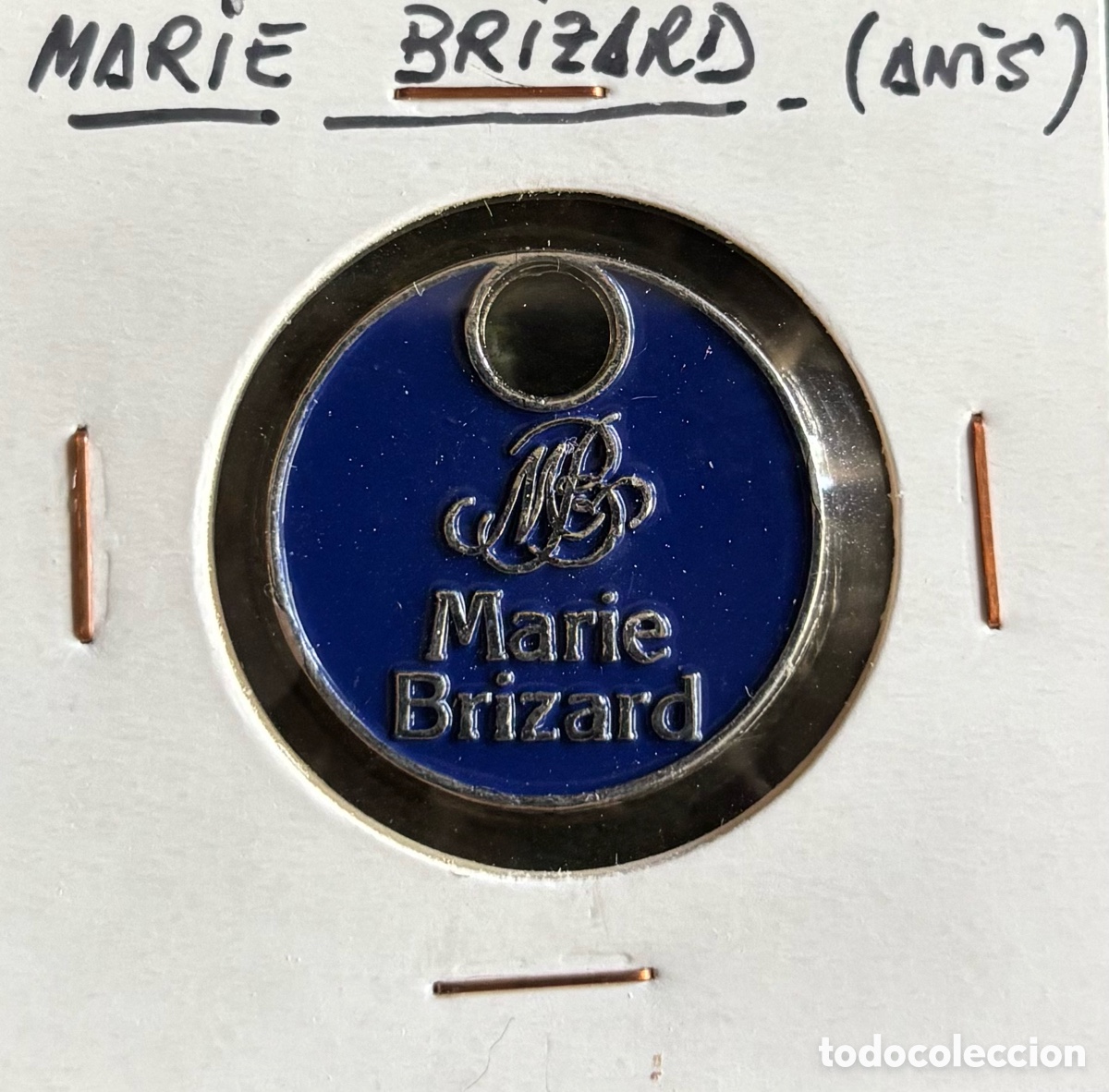 Monedas locales: Ficha publicidad. Marie Brizard