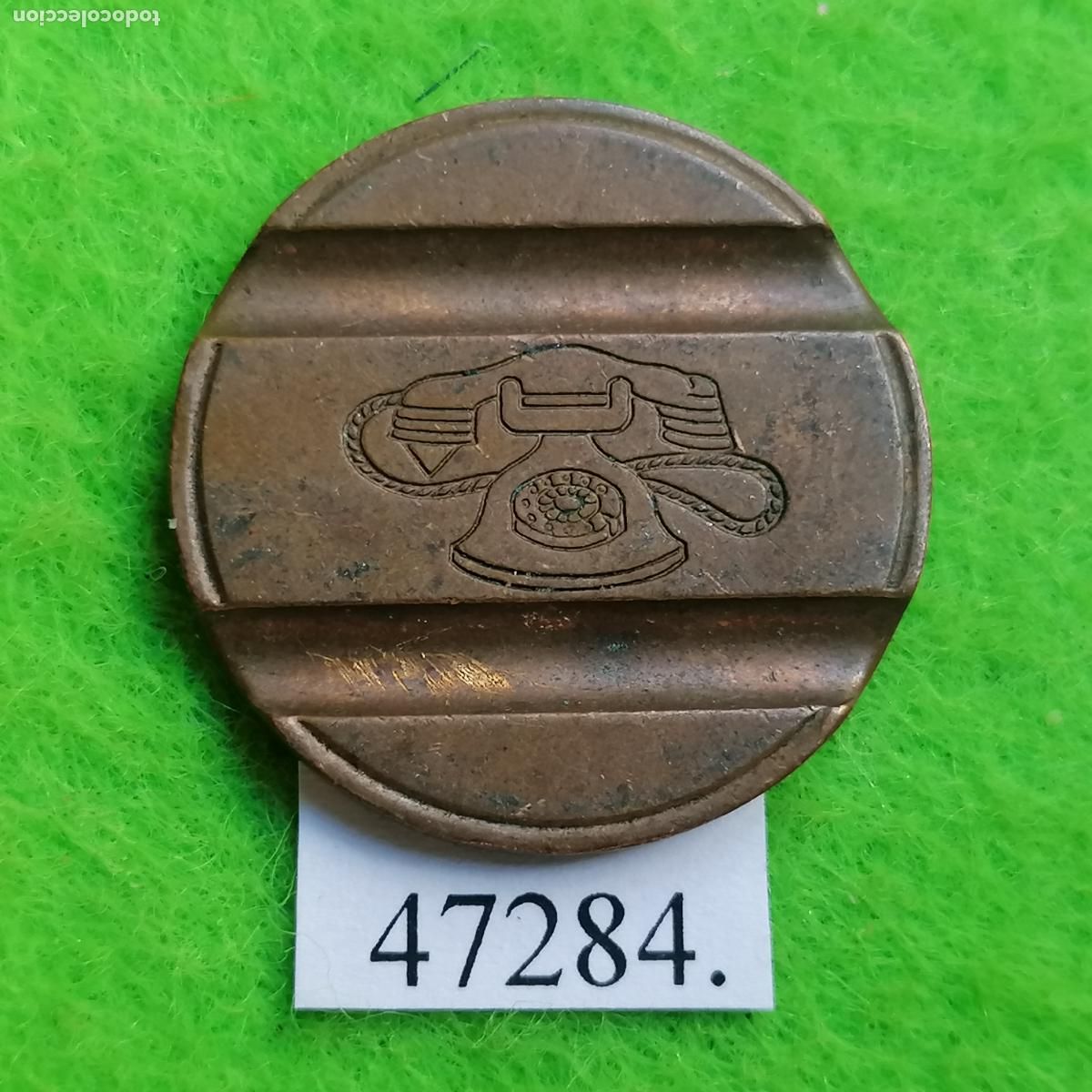 Monedas locales: ficha tel&eacute;fono Italia, 7705 IPM, token, jet&oacute;n