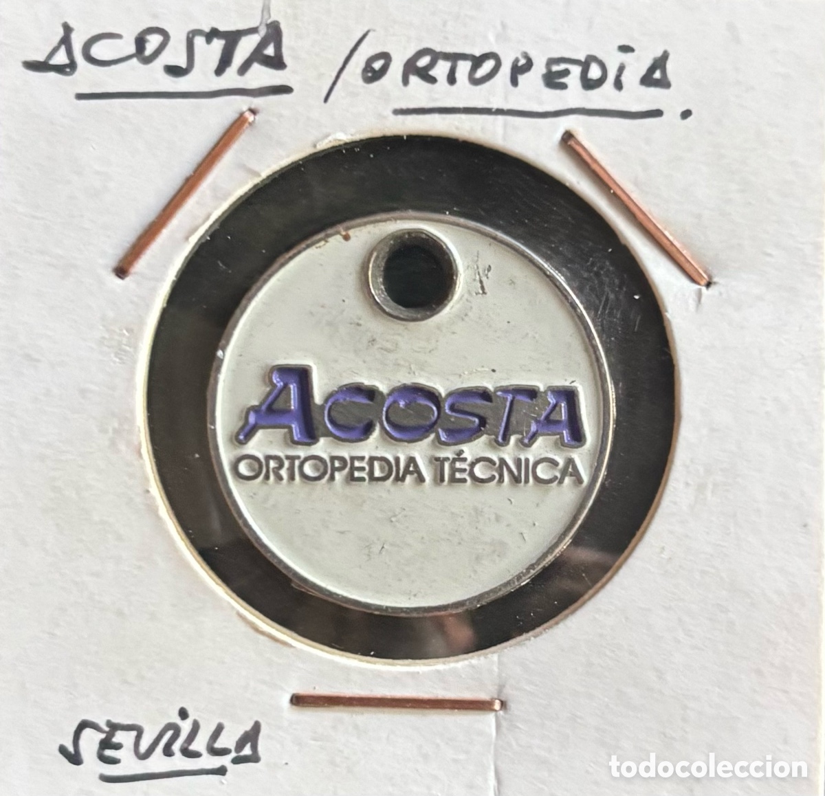 Monedas locales: Ficha publicidad. Acosta ortopedia. Sevilla