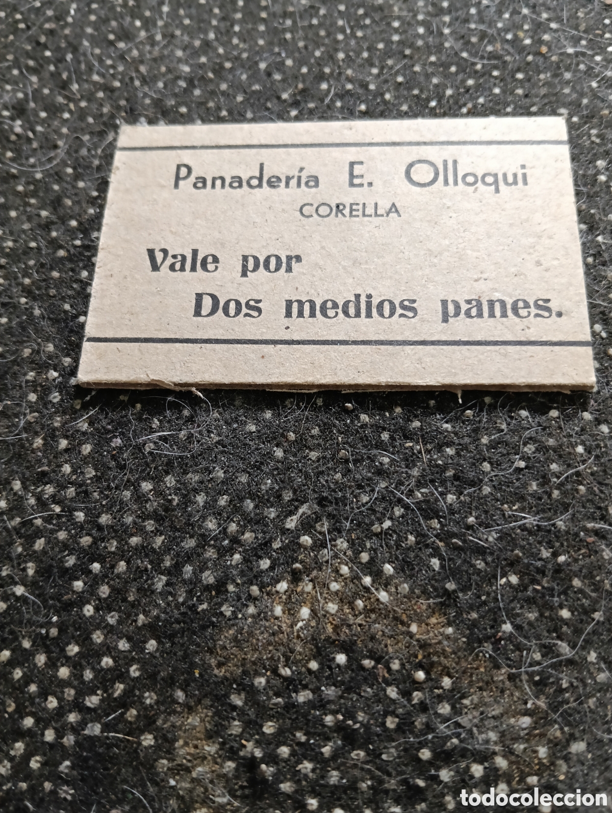 Monedas locales: 1940 aprox.Vale por dos medios panes, Panader&iacute;a Esteban Ollorqui, Corella, (Navarra) muy bien conser