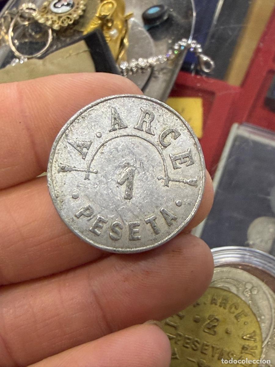 Monedas locales: Antigua ficha por clasificar
