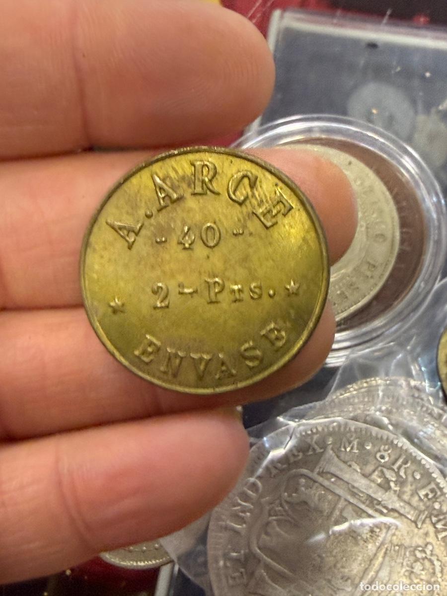 Monedas locales: Antigua ficha por clasificar