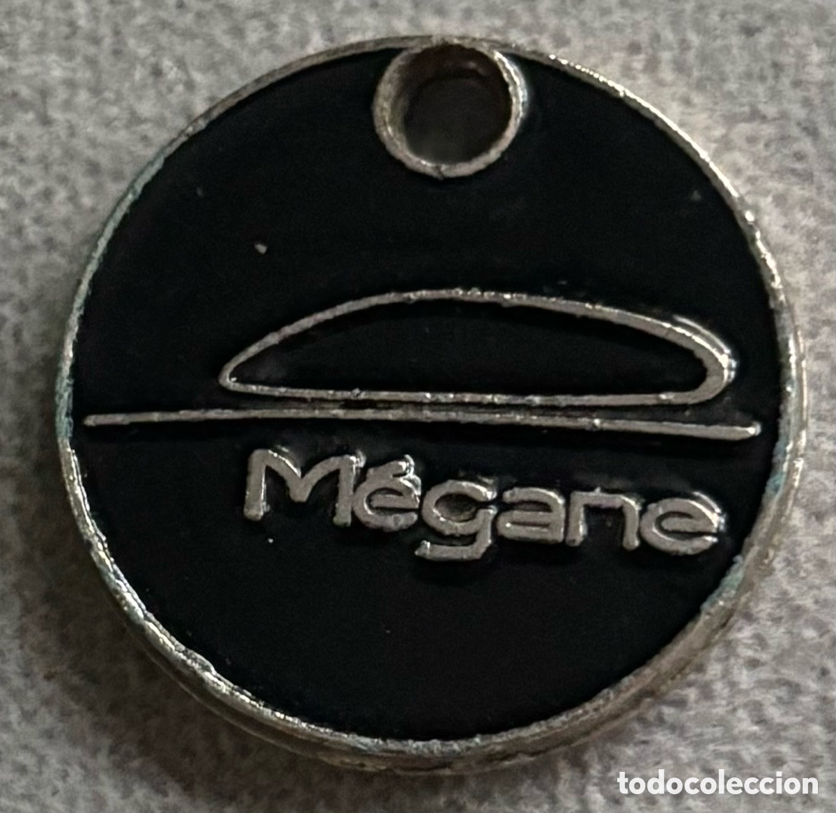 Monedas locales: Ficha publicidad. Megane