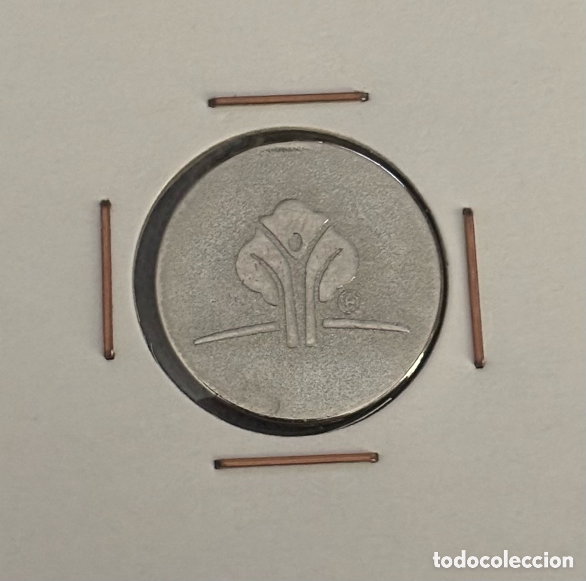 Monedas locales: Ficha publicidad. Especie de tr&eacute;bol.