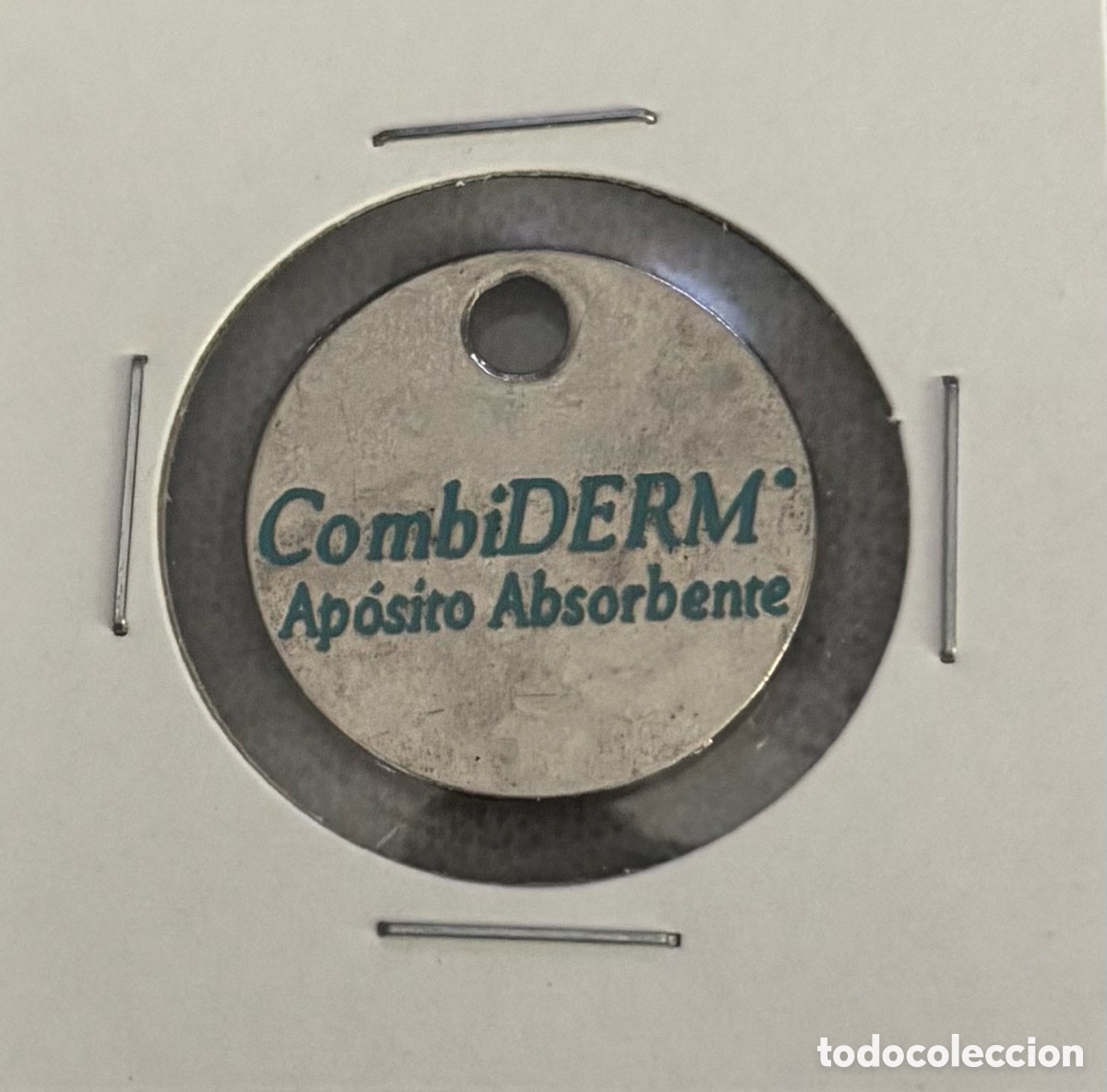 Monedas locales: Ficha publicidad. Combiderm. Convatec. - Foto 1