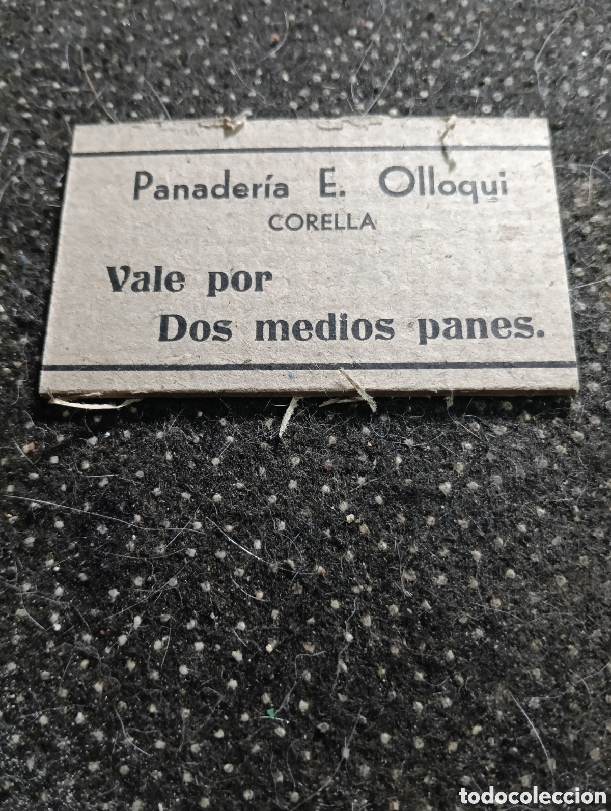 Monedas locales: 1940 aprox.Vale por dos medios panes, Panader&iacute;a Esteban Ollorqui, Corella, (Navarra) muy bien conser