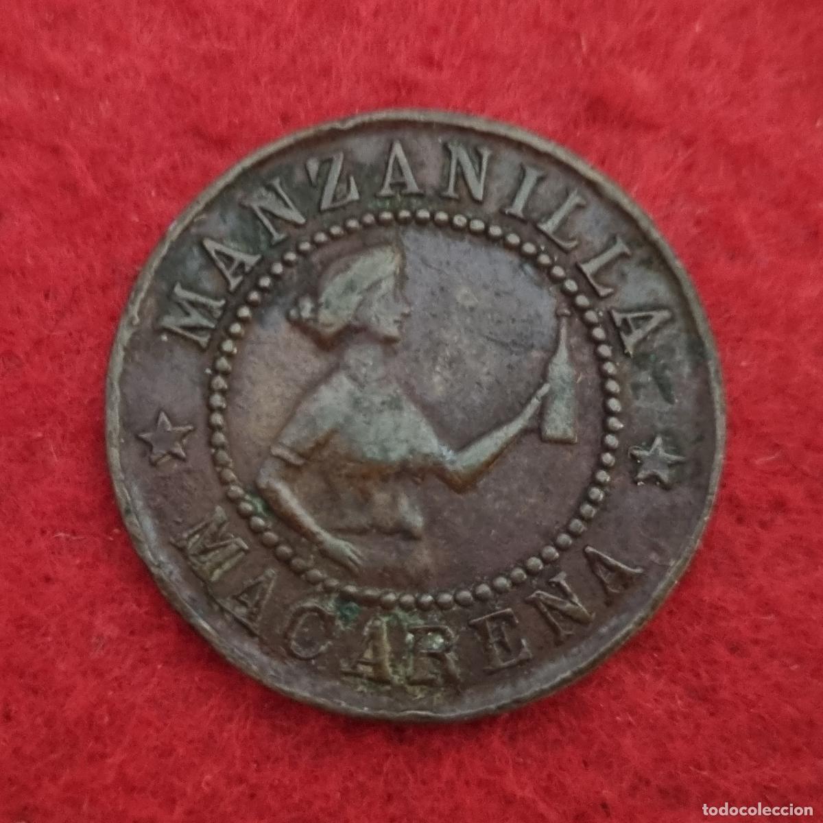 Monedas locales: FICHA PUBLICIDAD MANZANILLA MACARENA Y CO&Ntilde;AC CABALLERO LICORES ORIGINAL C11