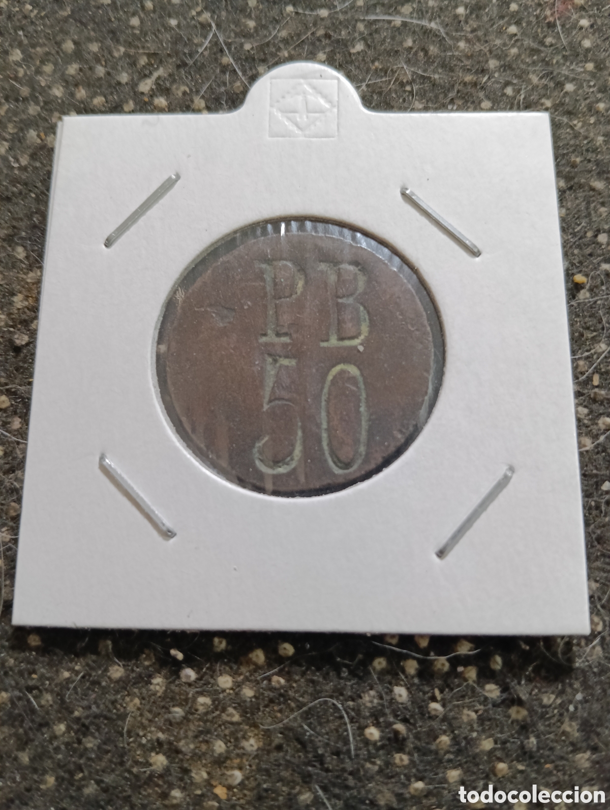 Monedas locales: FICHA (P.B. 50) DE COOPERATIVA DE LA ZONA DE L&Eacute;RIDA A INVESTIGAR, mide 2,50 cm. En cobre