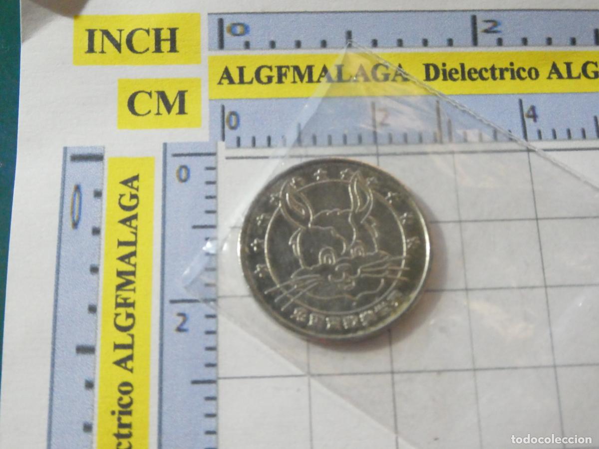 Monedas locales: MONEDA FICHA MEDALLA DE CHINA. CONEJO. MUNDO LIBRE Y FELIZ