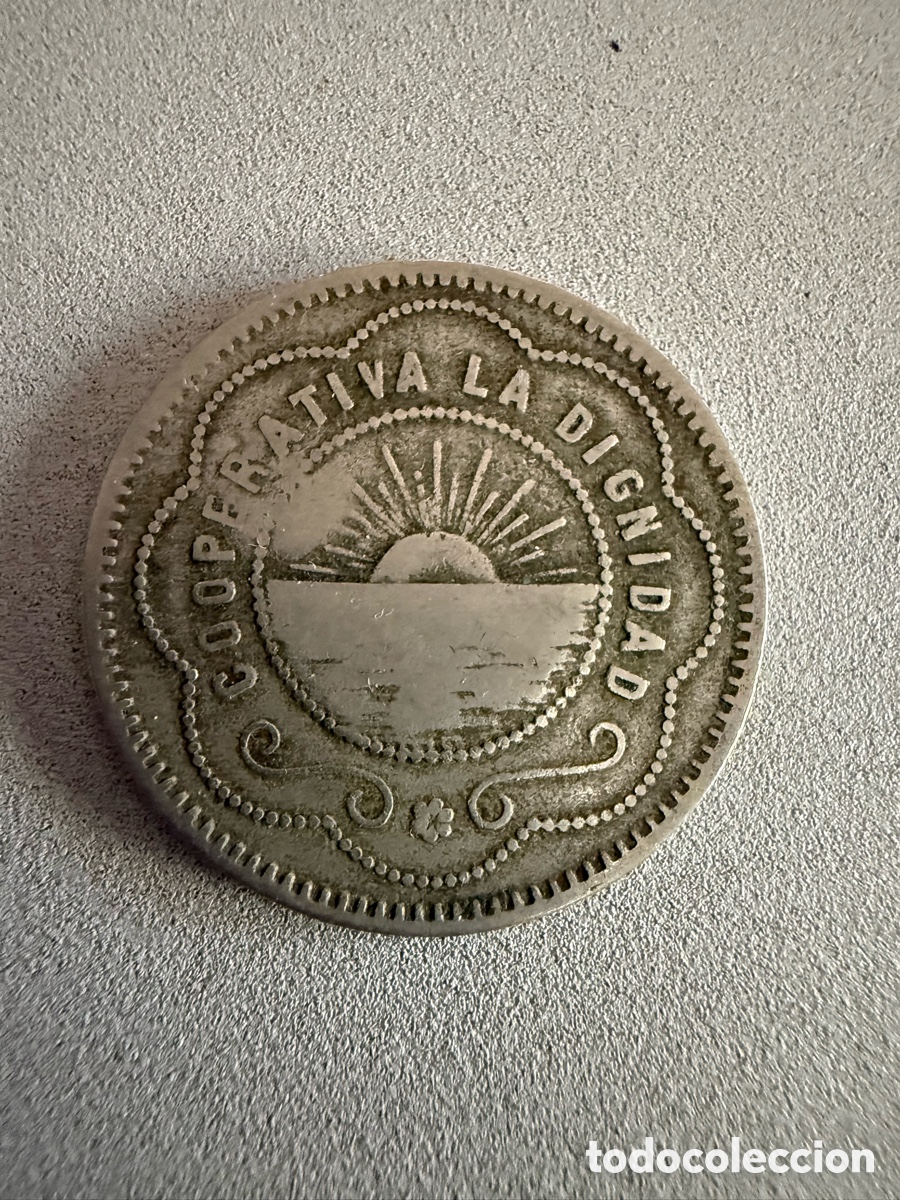 Monedas locales: Ficha. 1 PESETA. COOPERATIVA LA DIGNIDAD.