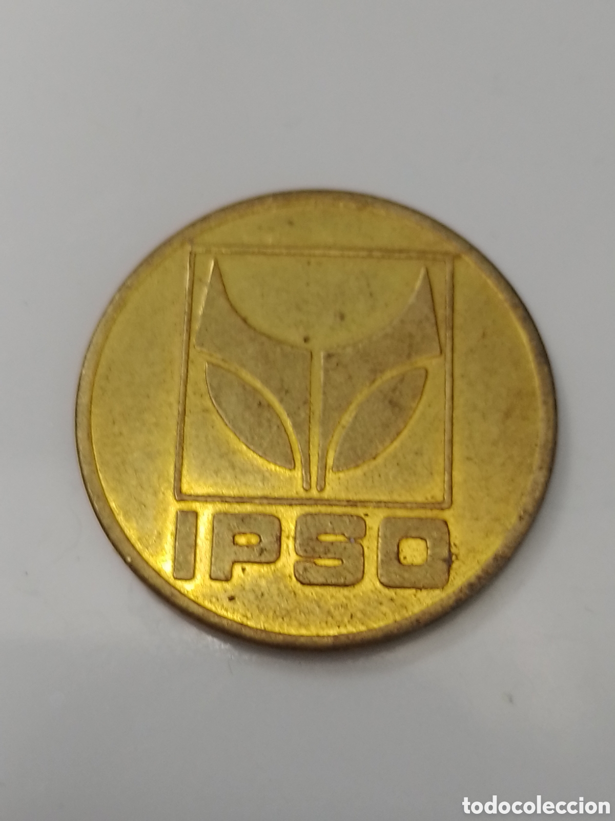 Monedas locales: Ficha dineral IPSO - 15 K.