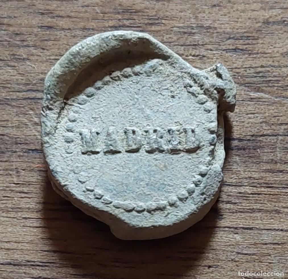 Monedas locales: Plomo marchamo comercial Madrid AH