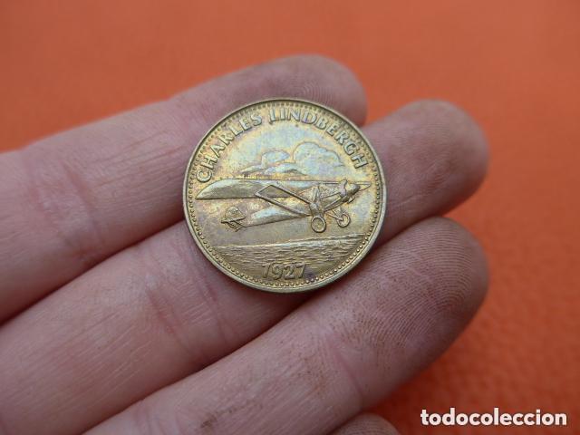 Monedas locales: Antigua moneda o ficha de shell token para sus gasolineras en 1969 - 1970, original.