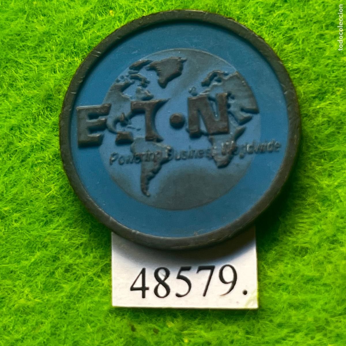 Monedas locales: ficha Eaton Corporation, Powering Business Worldwide, token, jet&oacute;n