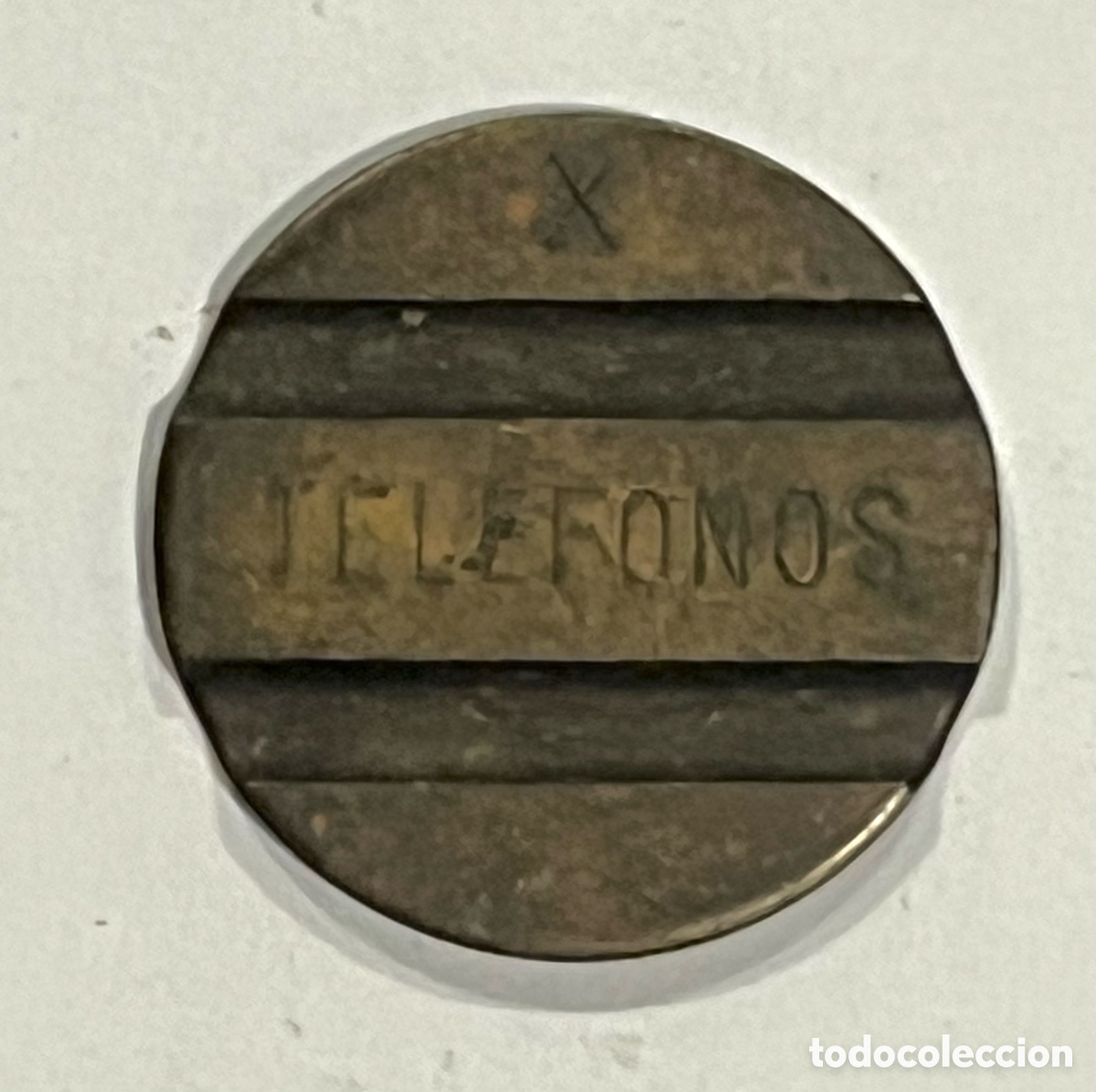 Monedas locales: FICHA TELEFONICA (CTNE), LETRA X