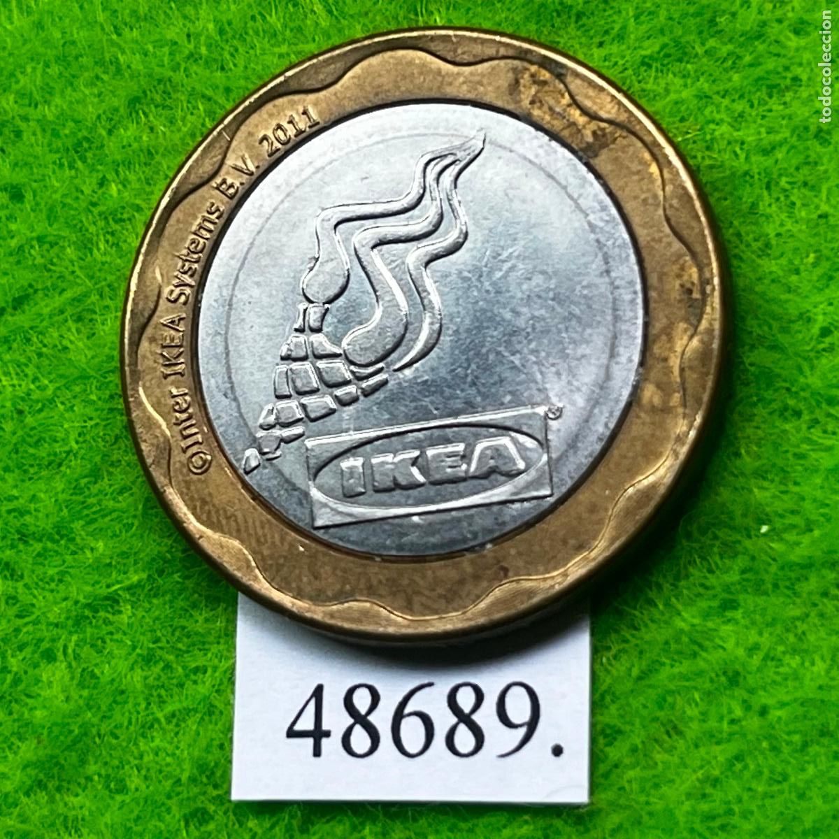 Monedas locales: Ficha IKEA 2011, bimetalica, token, jeton