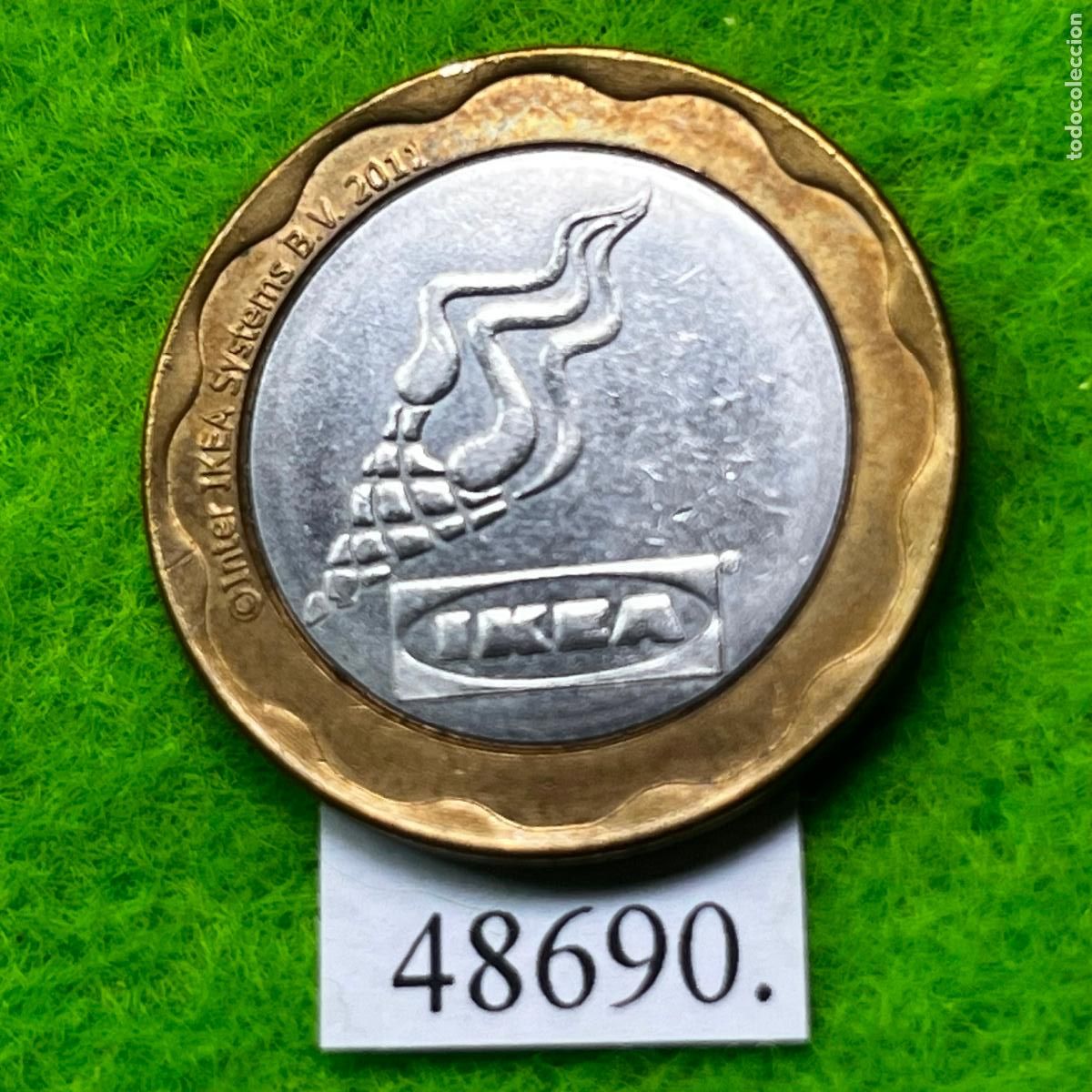 Monedas locales: Ficha IKEA 2011, bimetalica, token, jeton