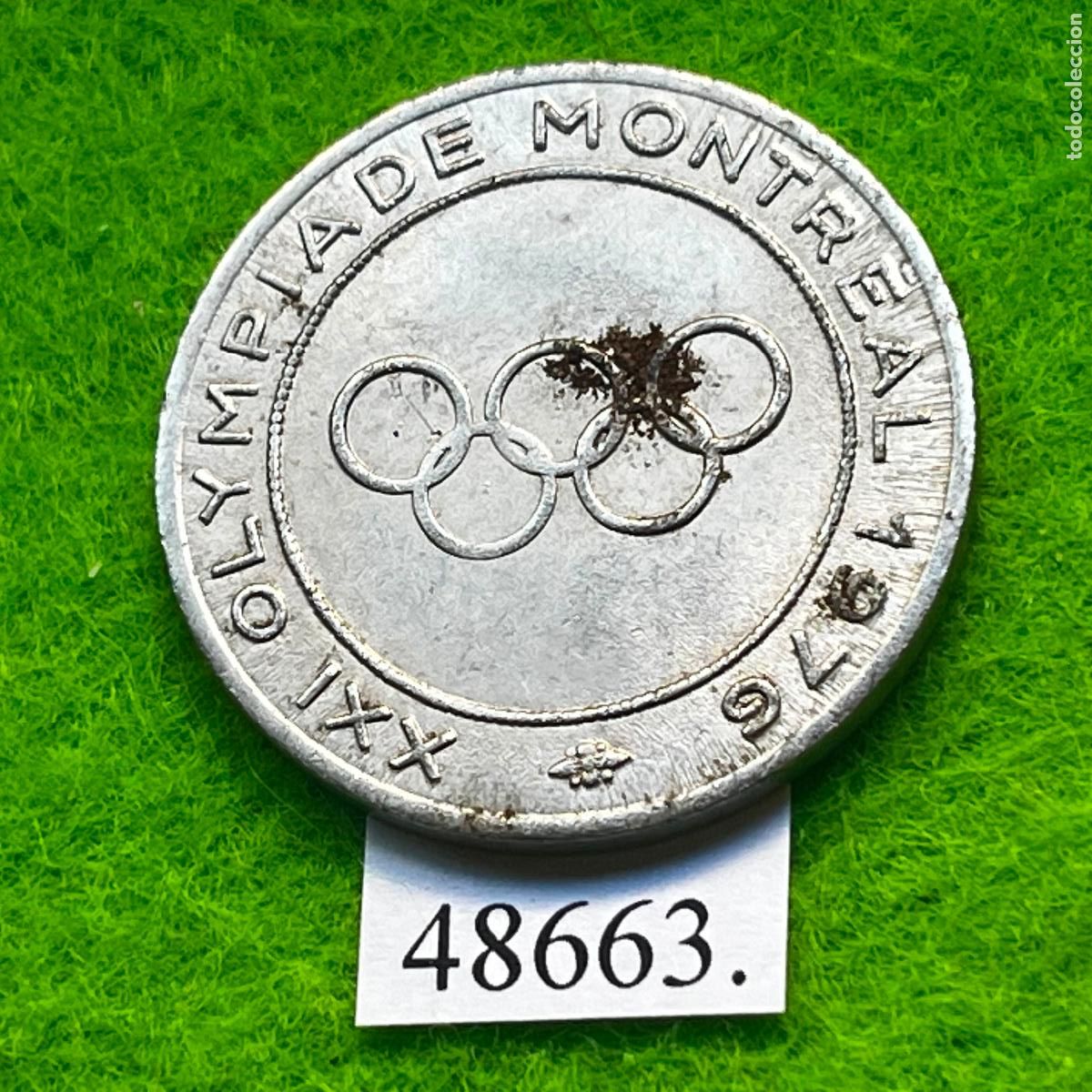 Monedas locales: ficha Italia, RIVA DEL GARDA, APPARECCHI ELETTRICI, olimpiadas Montreal 1976, token, jet&oacute;n