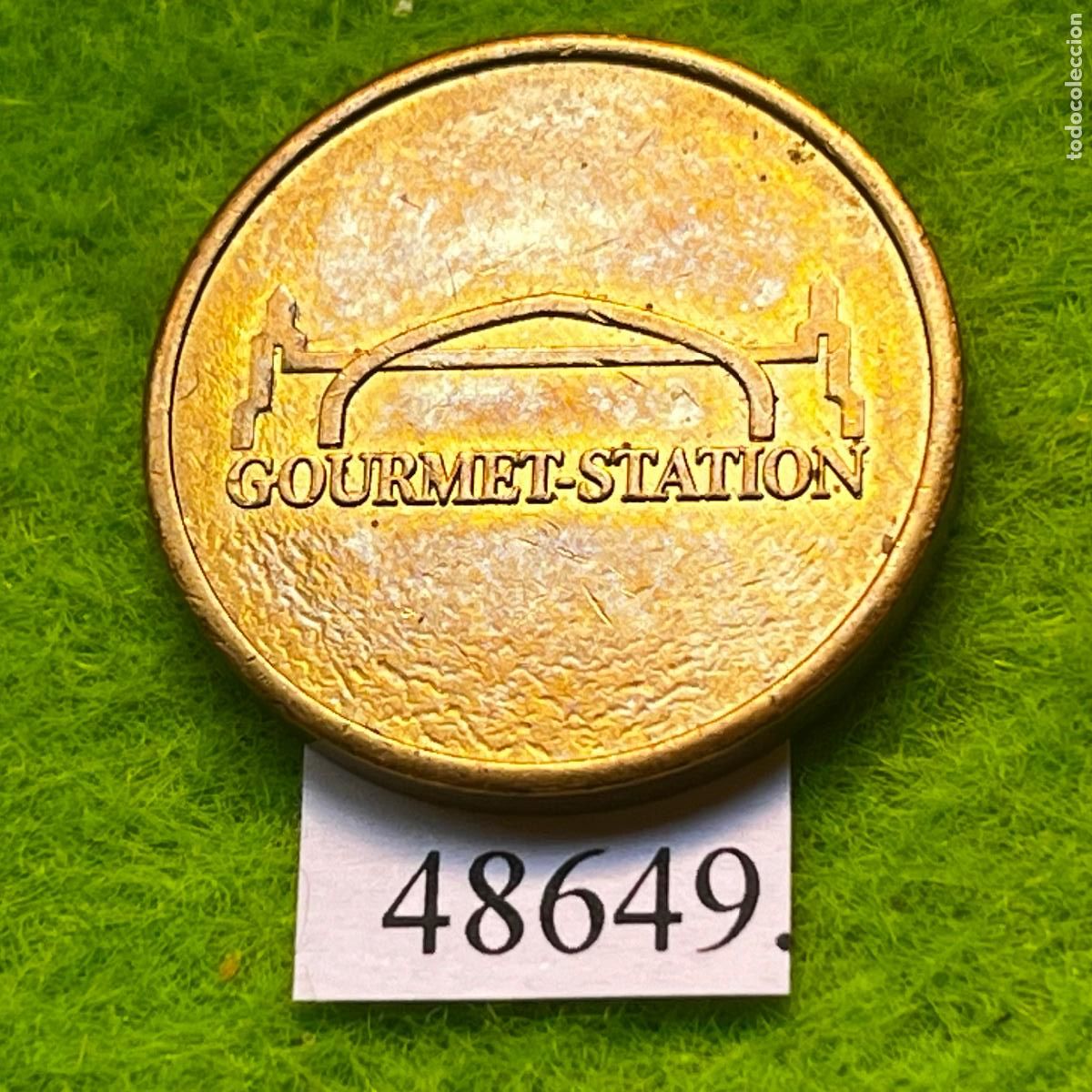 Monedas locales: ficha, Gourmet-Station, token, jet&oacute;n