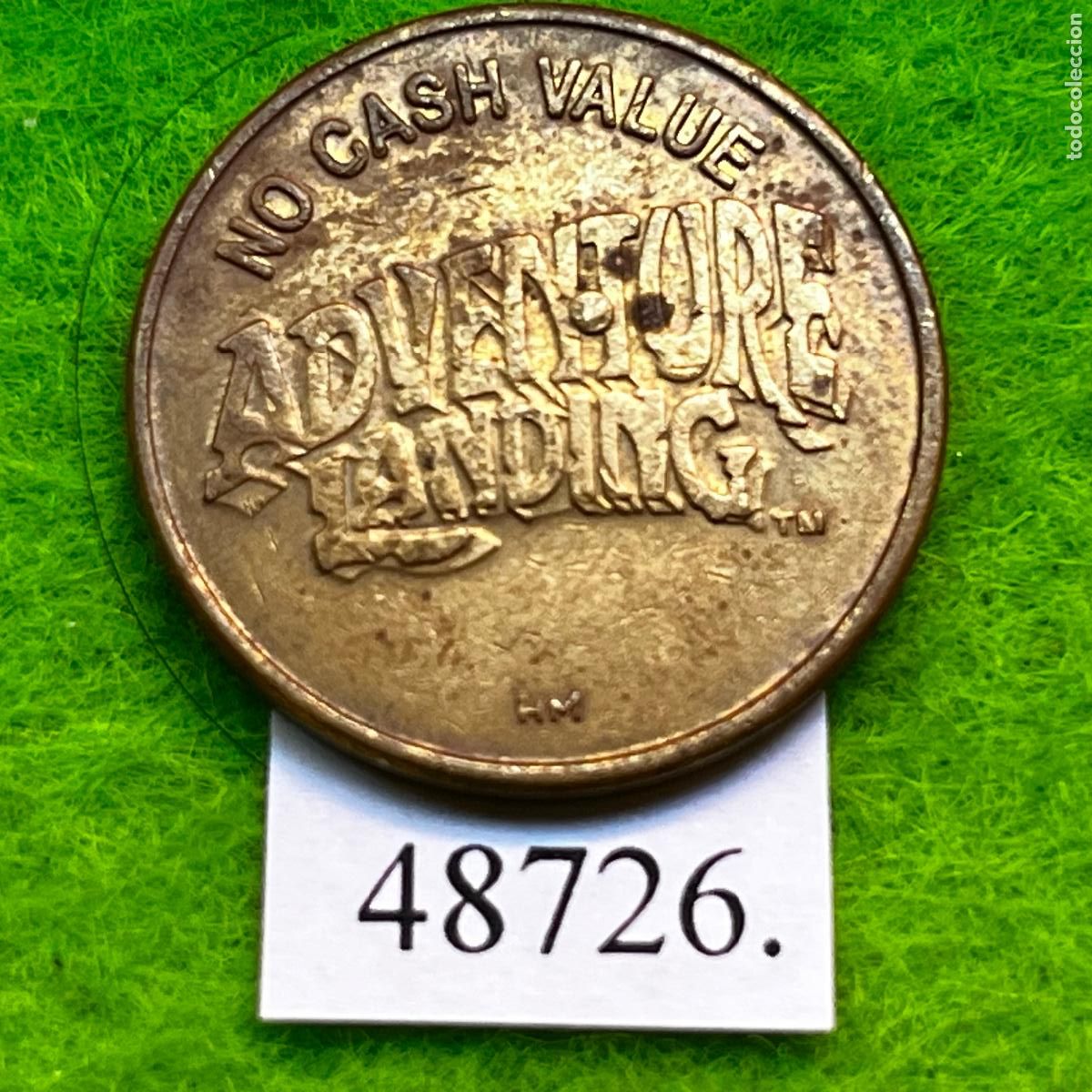 Monedas locales: ficha Estados Unidos, Adventure Landing, Hoffman Mint, arcade, juegos recreativos, token, jet&oacute;n