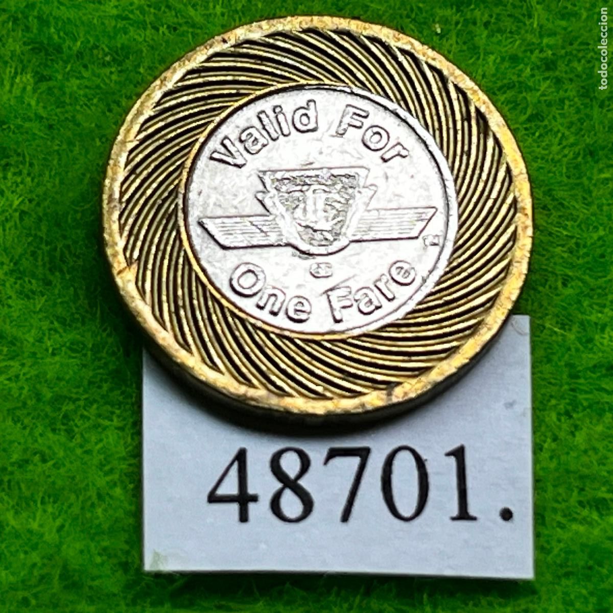 Monedas locales: ficha Canad&aacute;, Toronto Transit Commission (TTC), transporte p&uacute;blico, bimet&aacute;lica, token, jet&oacute;n