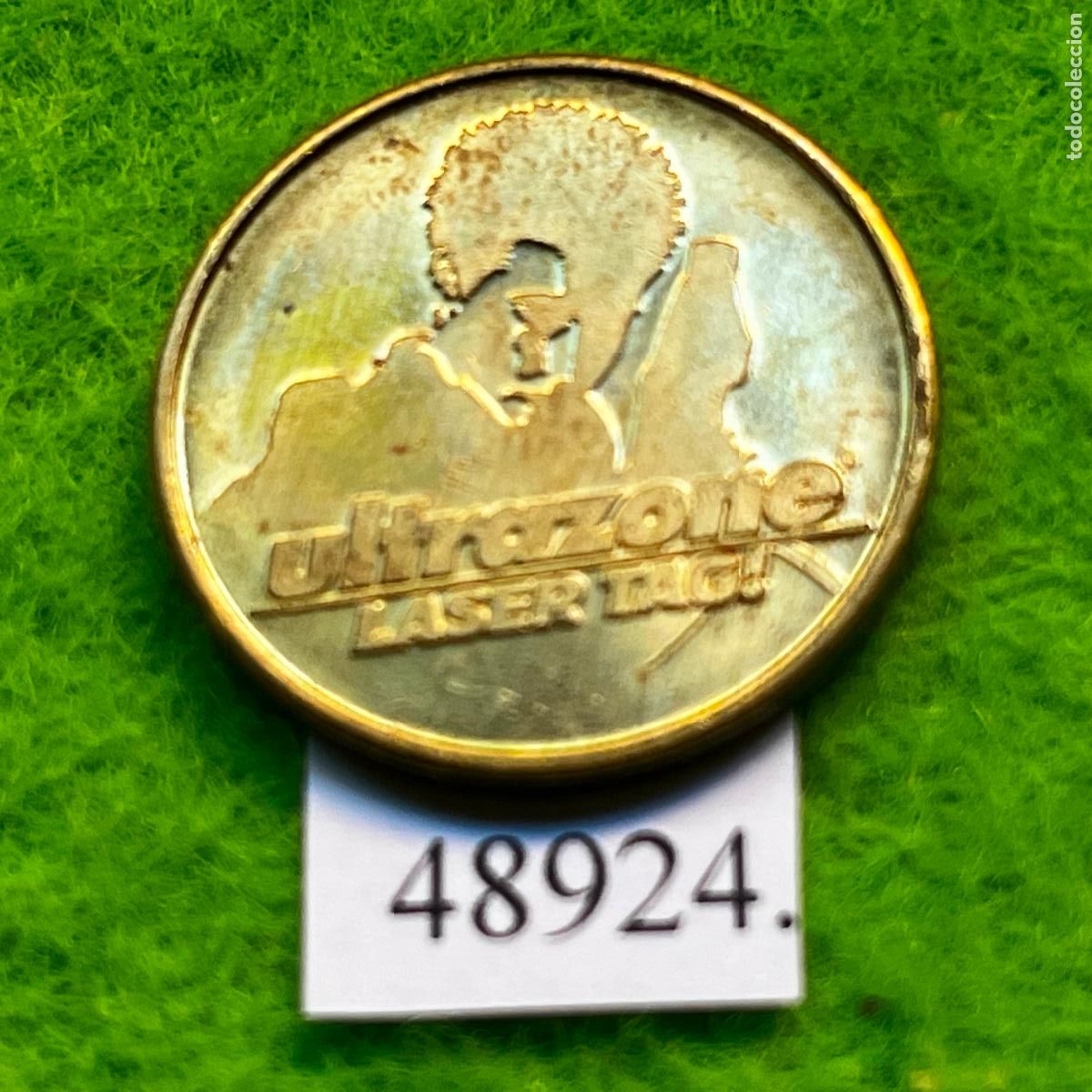 Monedas locales: ficha Estados Unidos, Sherman Oaks, California, Ultrazone LAZER TAG, juegos recreativos token, jet&oacute;n
