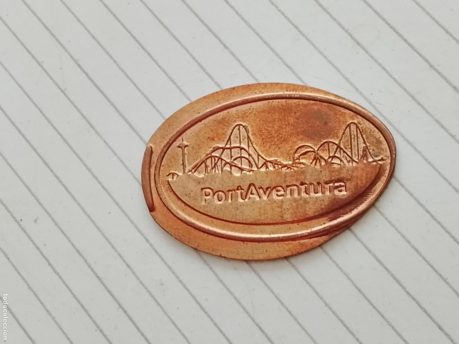 Monedas locales: Token / ficha enlongada. Port Aventura