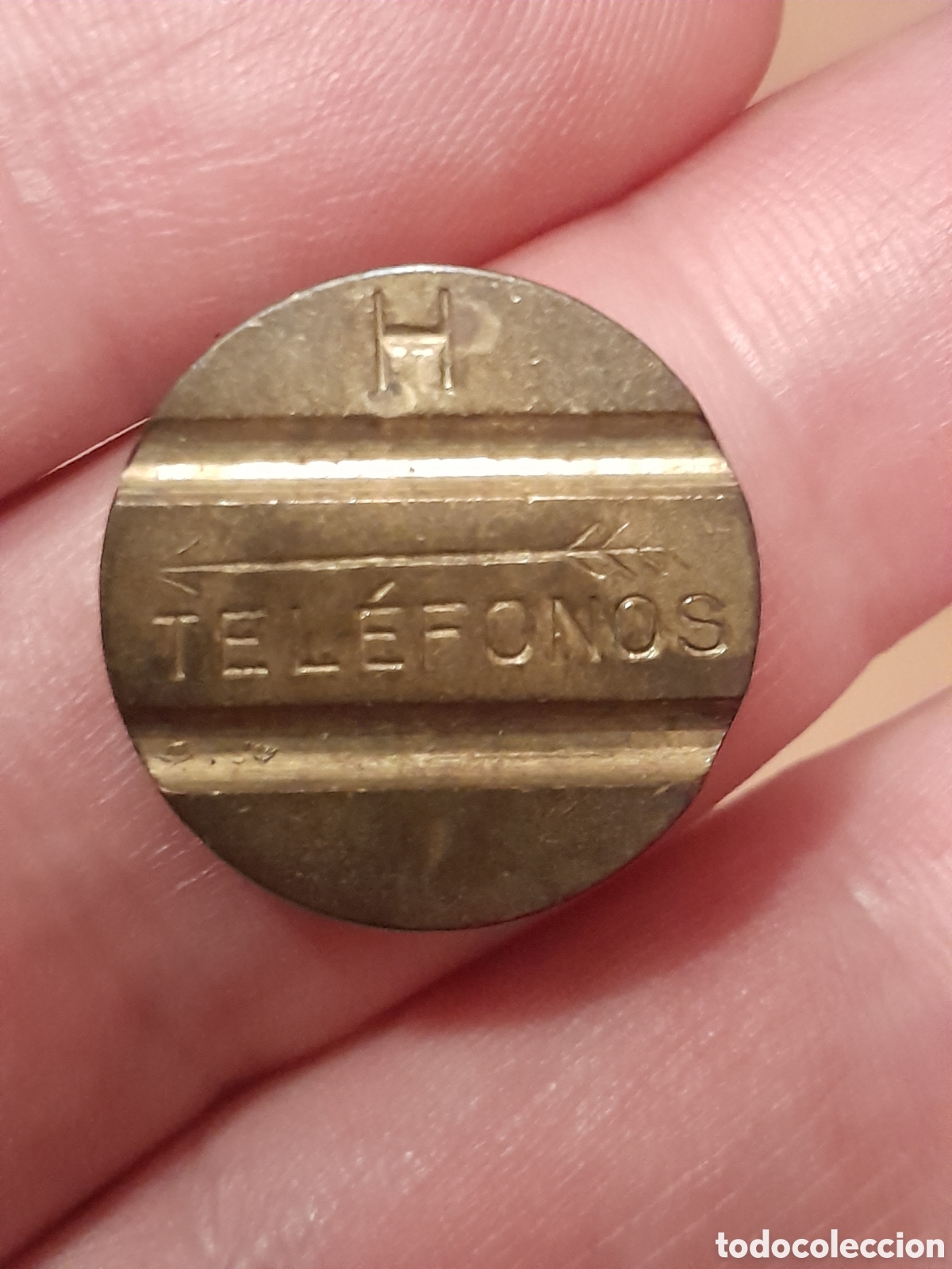 Monedas locales: Ficha de telefono rara