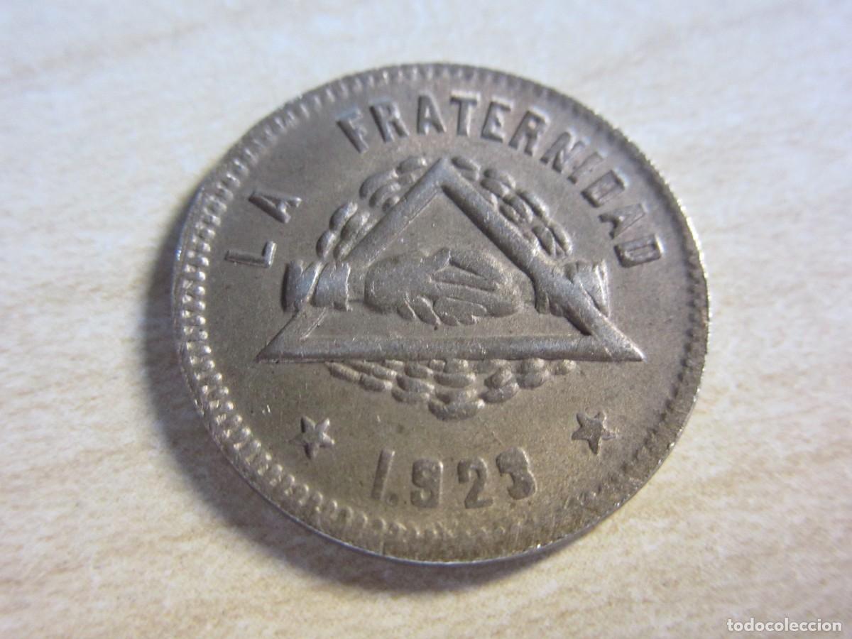 Monedas locales: Ficha monetaria de 25 c&eacute;ntimos Cooperativa La fraternidad 1923 Calle San Carlos 9 Barceloneta
