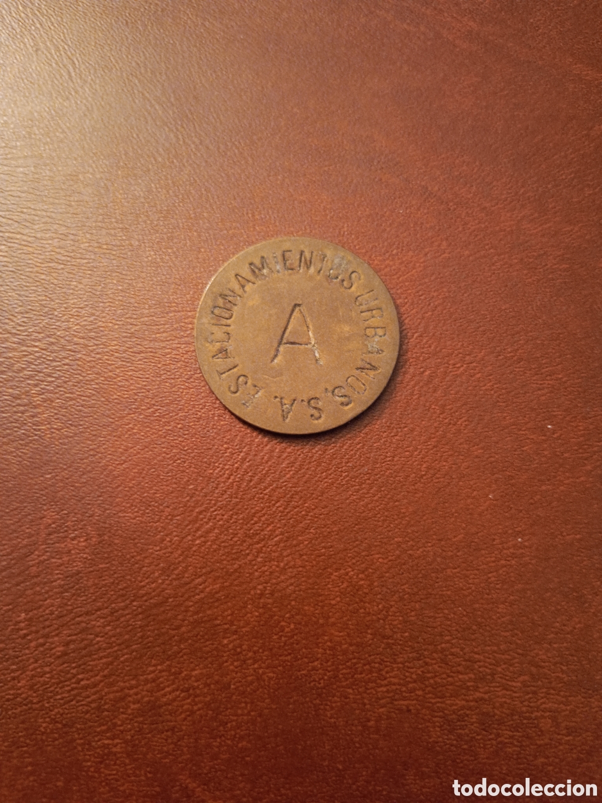 Monedas locales: FICHA ESTACIONAMIENTOS URBANOS A - VALIDO DURANTE 15 MINUTOS - 2,8 CMS