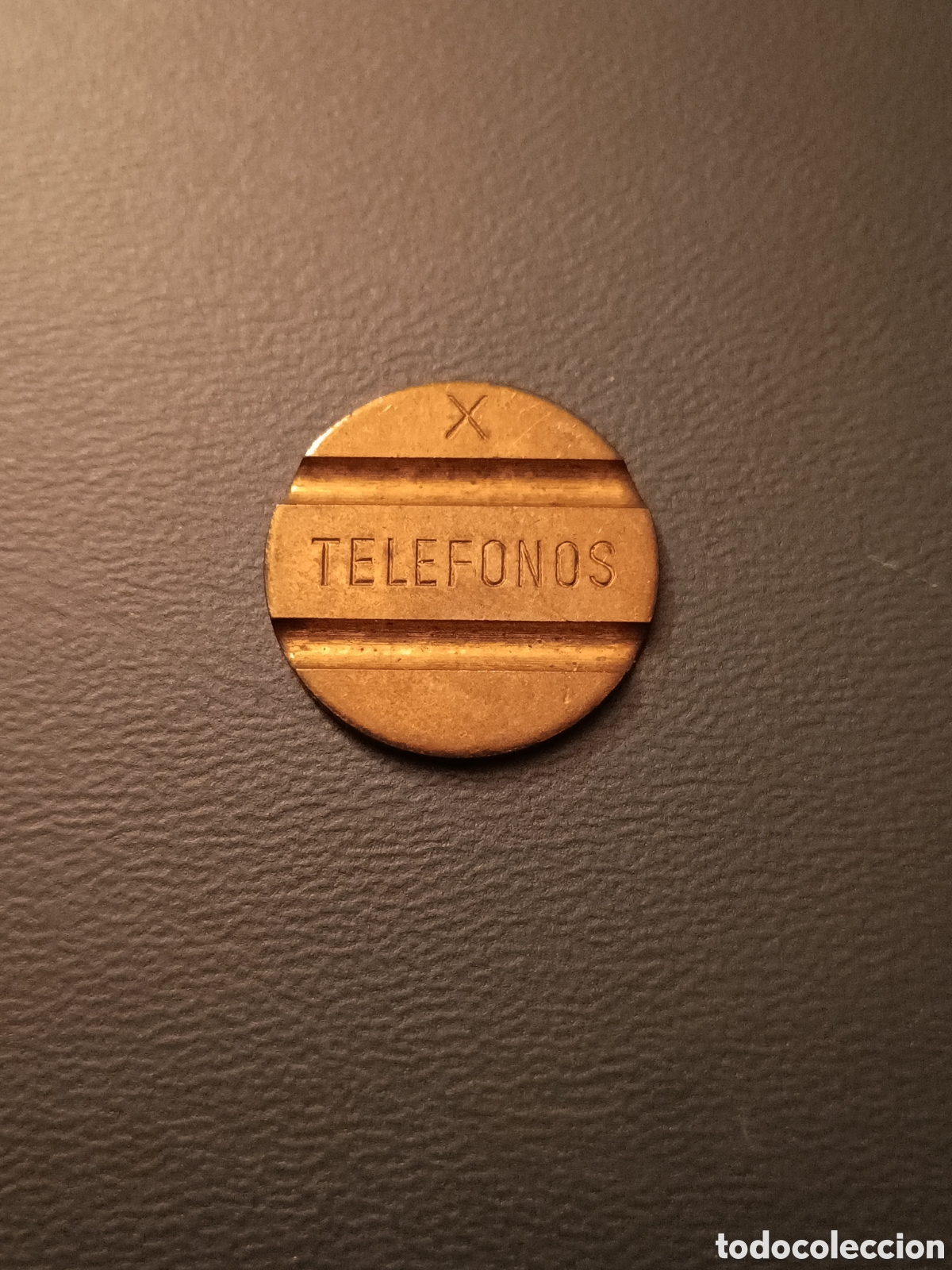 Monedas locales: ANTIGUA FICHA PARA CABINAS - TELEFONOS - X